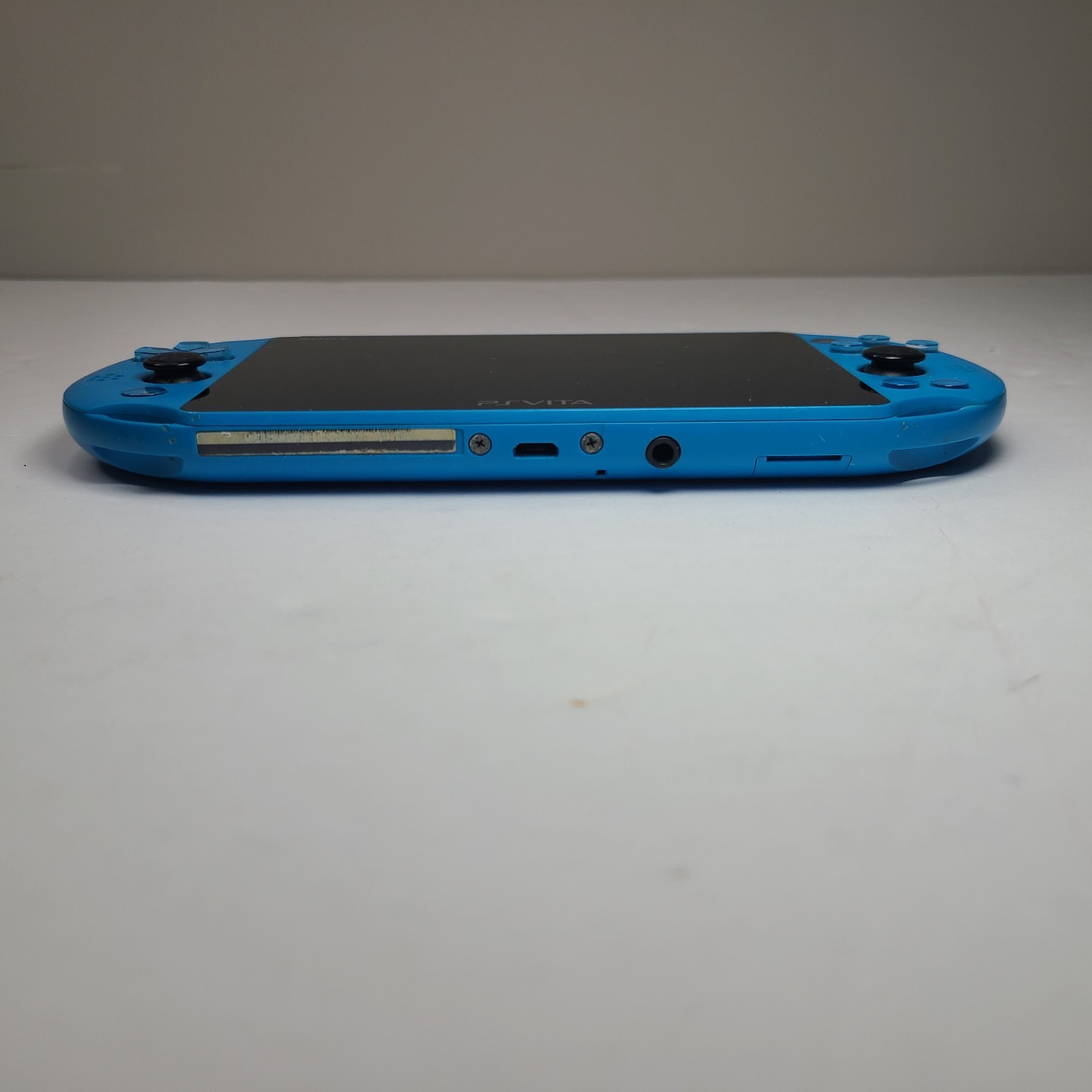 Sony PS Vita PCH 2000 ZA23 Aqua Blue Slim Console W/ LEGO Jurassic World Game