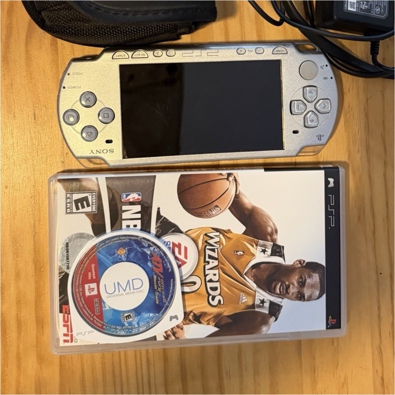 Sony PSP-2001 Handheld Console Bundle w/ Case, AC Adapter, 2 games, 1 GB memory
