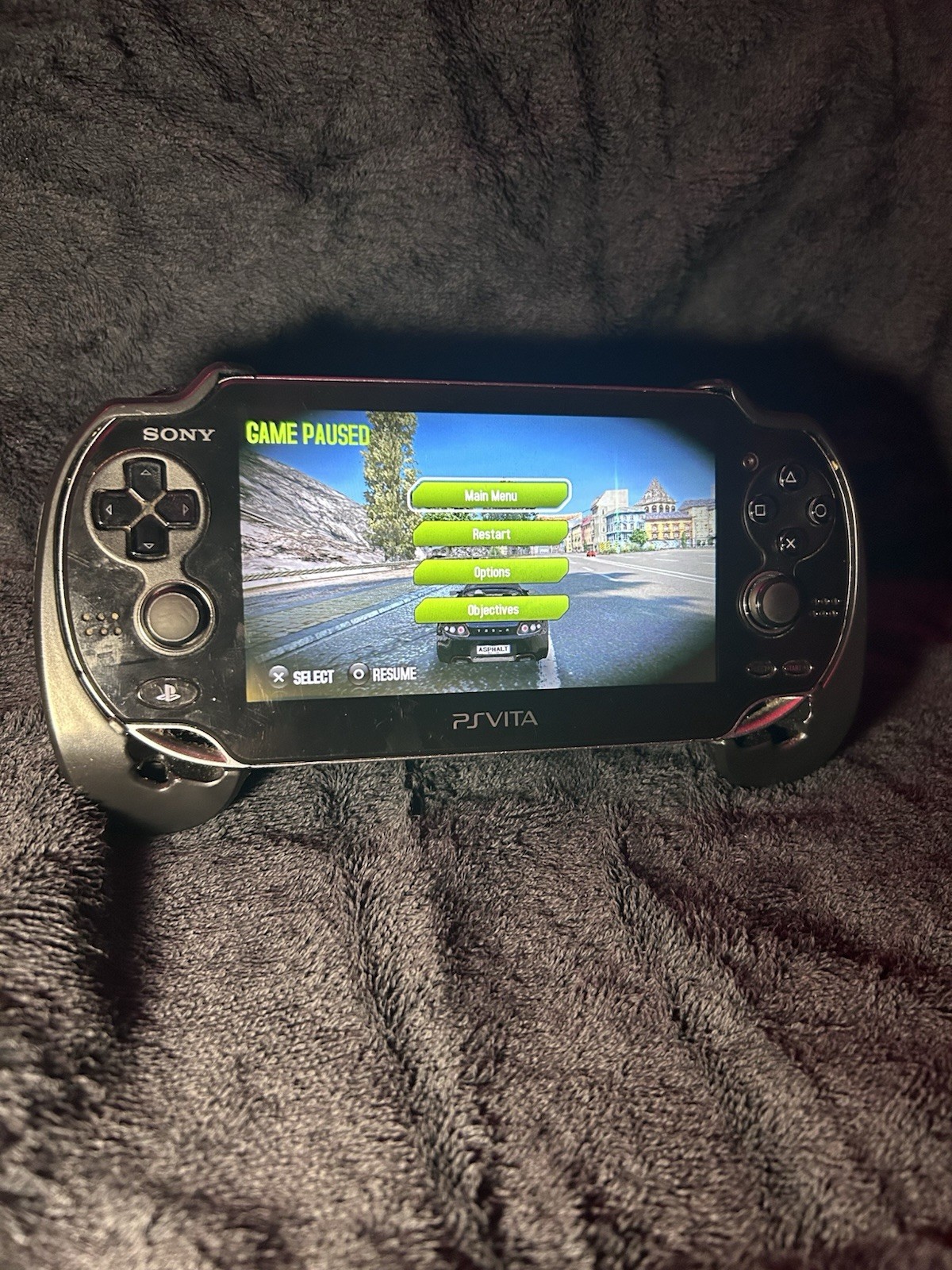 Sony PS Vita PCH-1000 Black 4GB Wi-Fi Handheld w/ Memory Card & Adapter