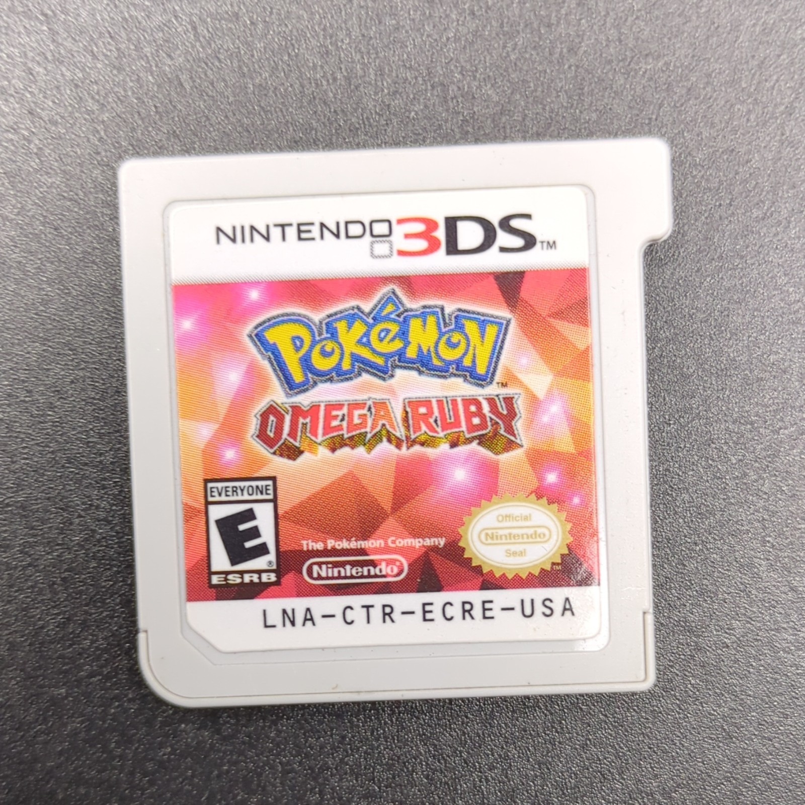 Nintendo New 3DS XL Red Console Bundle w/ Pokemon Platinum, Sun, X, Omega Ruby