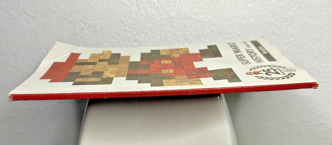 Super Mario History 1985-2010 25th Anniversary Booklet Pre Owned FAST SHIPPING