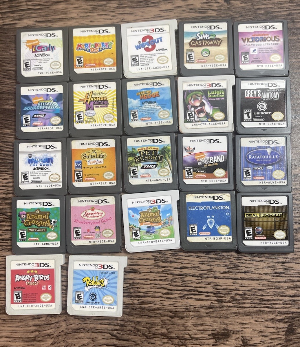 Nintendo 3DS Midnight Purple Portable Gaming Console & 35 Games