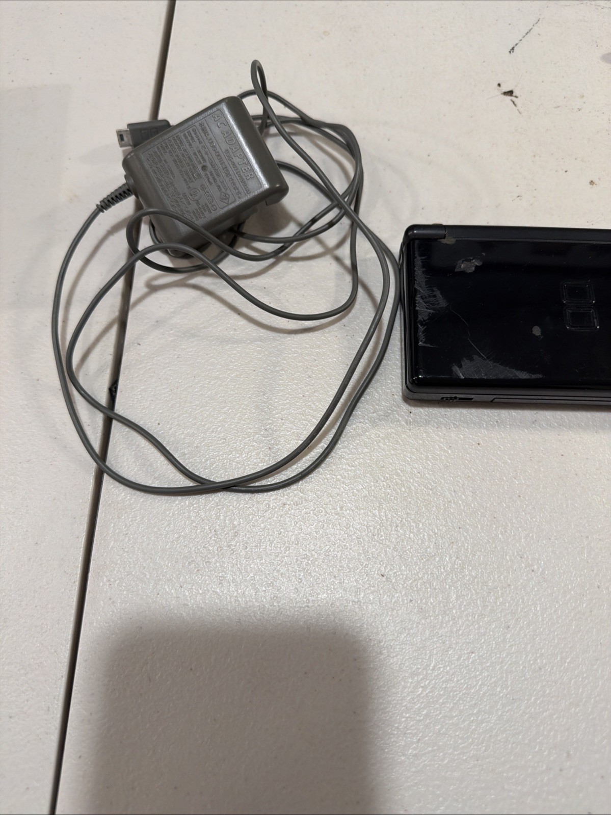 Nintendo DS Lite Handheld System – Onyx Black (Missing Stylist)