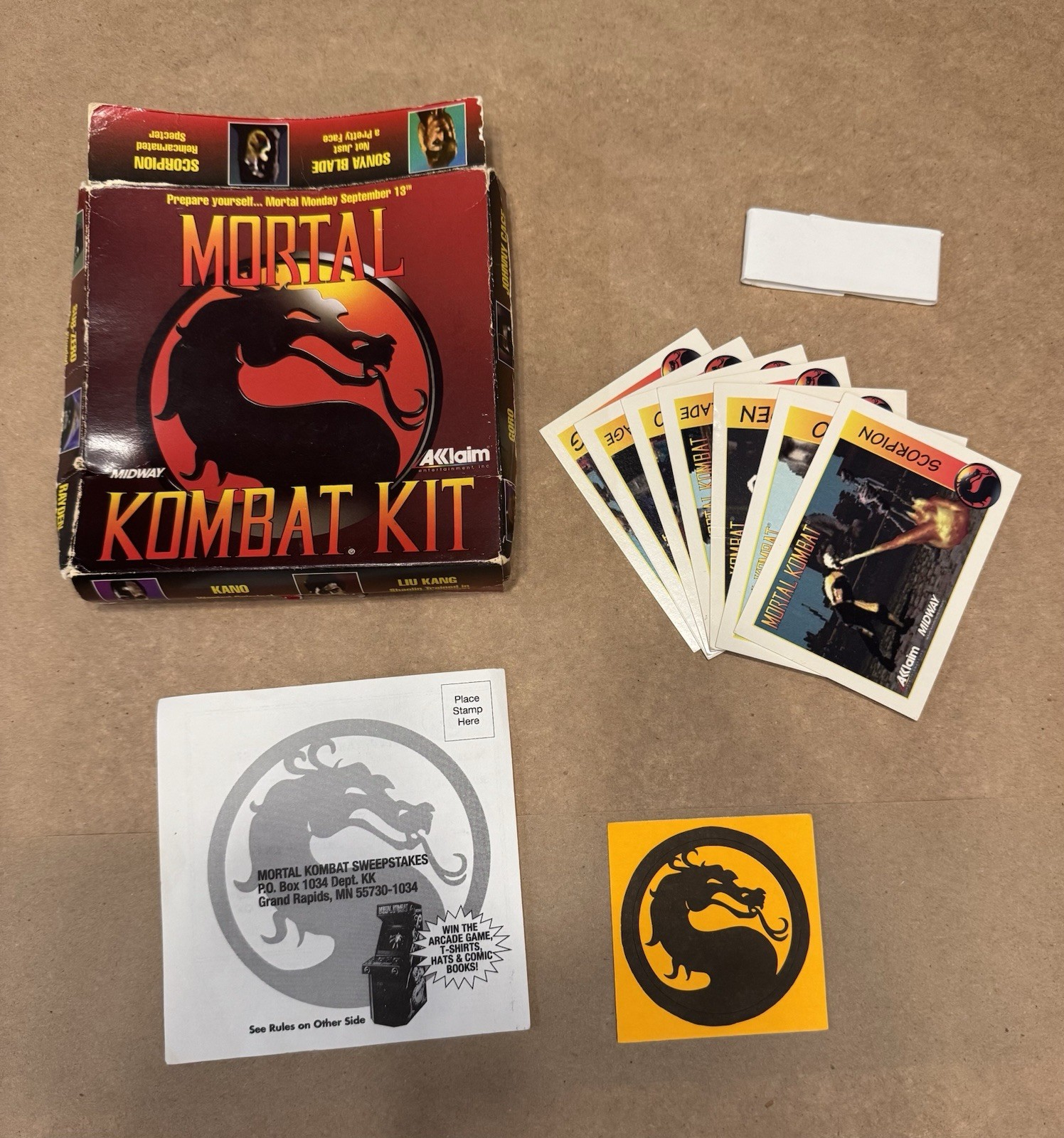 Mortal Kombat Collector’s Lot- Lunch Box, PC floppy, Kit, Cards, Coin, Buttons