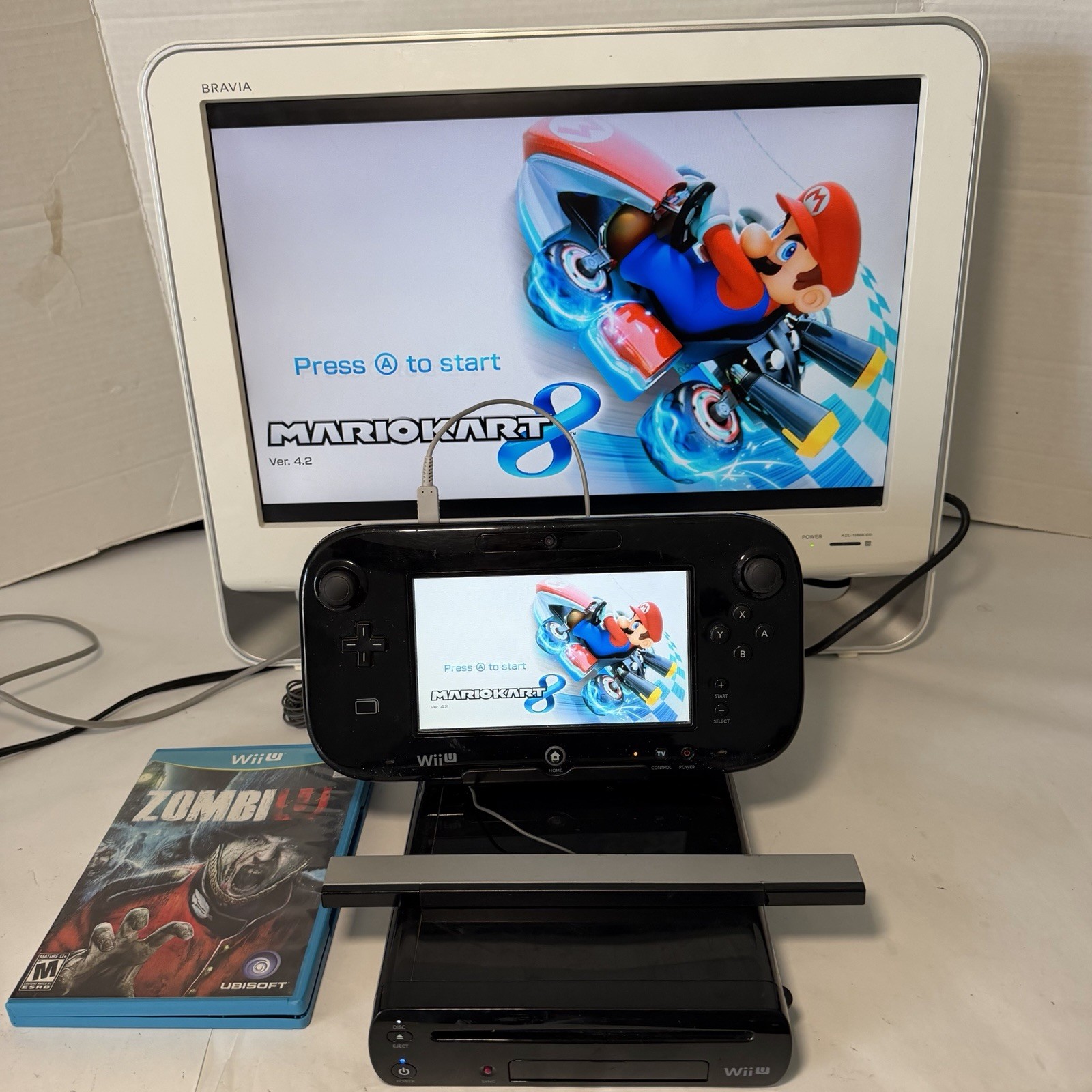 Nintendo Wii U 32GB Black Deluxe Console & Gamepad W/ Mario Kart 8 And Zombie U