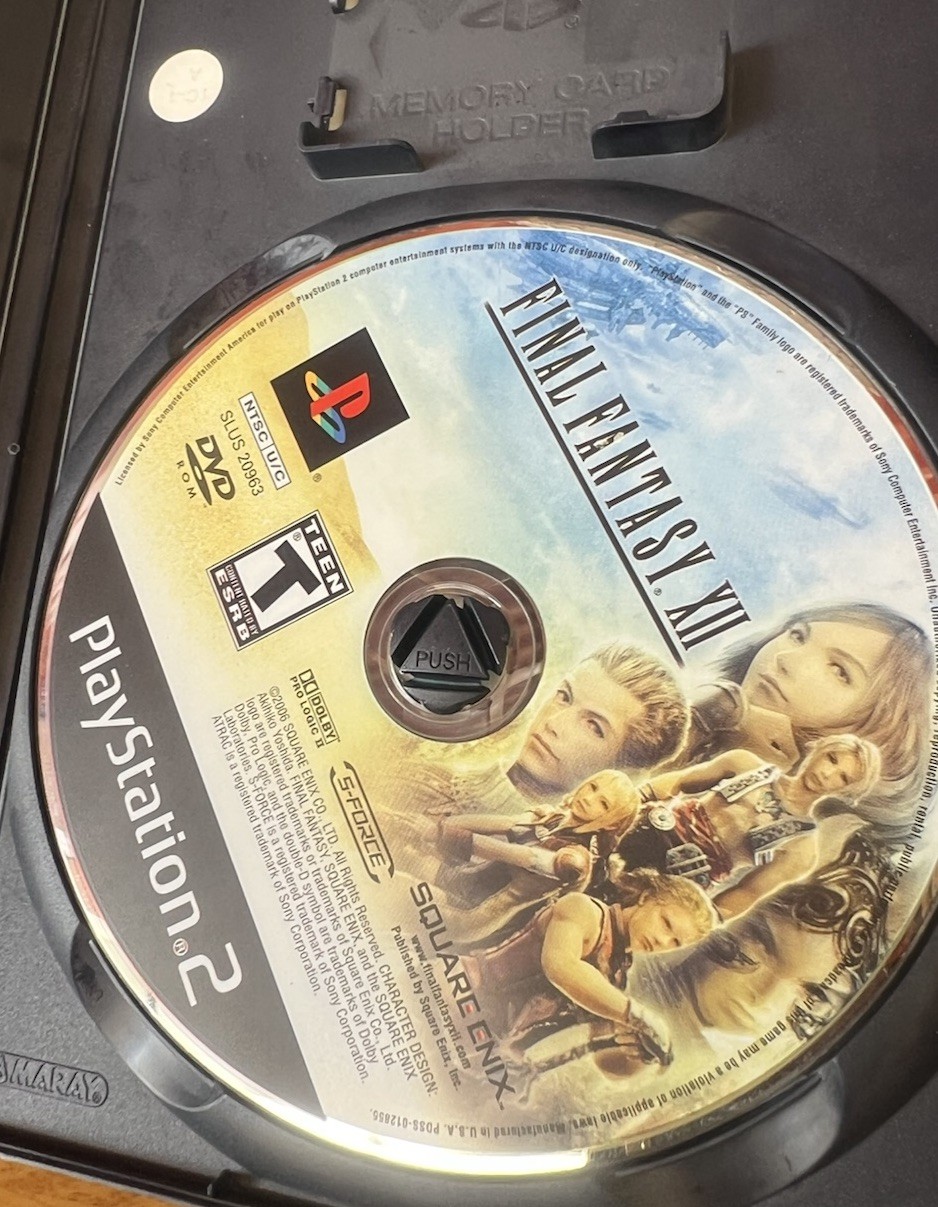 Square Enix Final Fantasy XII 2006 Teen Version Sony PlayStation W/ Book