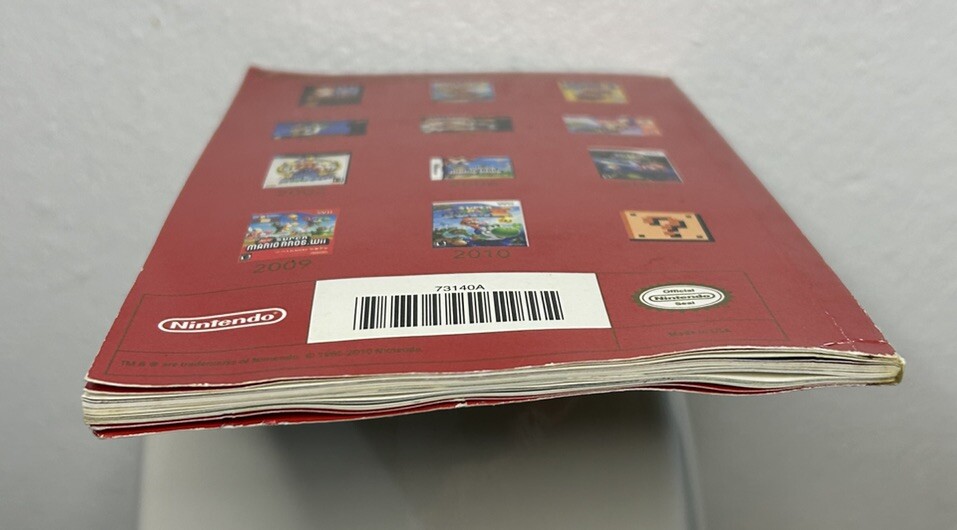 Super Mario History 1985-2010 25th Anniversary Booklet Pre Owned FAST SHIPPING