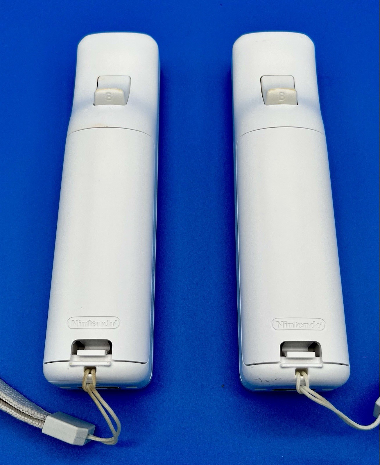 “Not Working”- Nintendo Wii White Remotes (2) with Straps & Sports Attachments