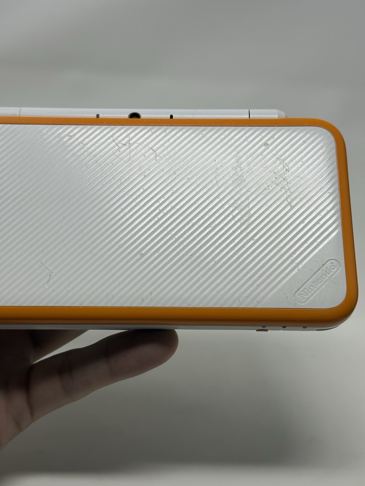 New Nintendo 2DS XL Orange White Handheld USA System w Charger Stylus and Extras