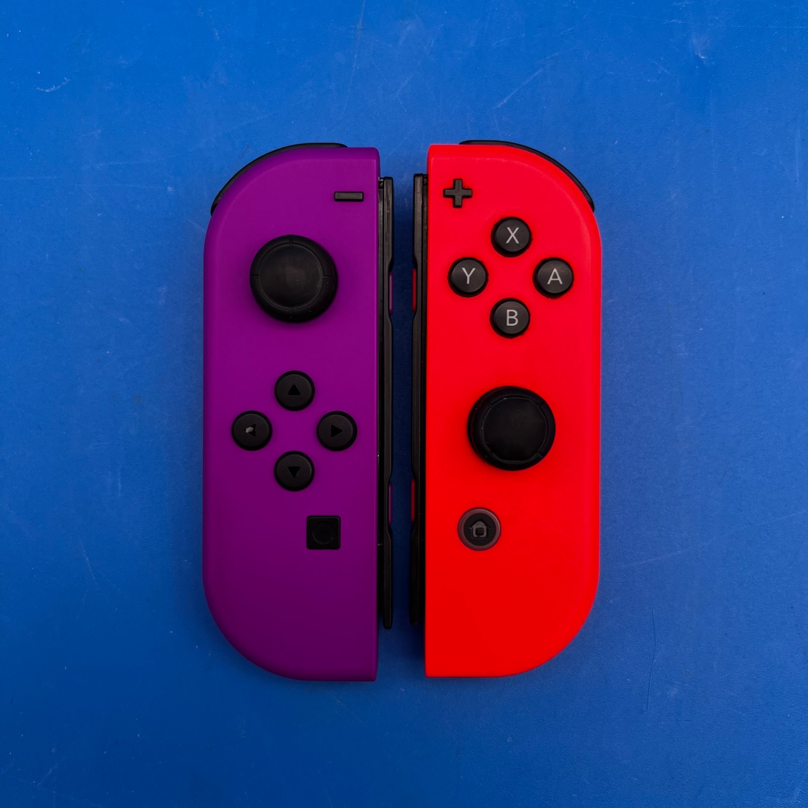 Nintendo Switch OLED Model HEG-001 Handheld Console – 64GB (Red/Purple Joy-Cons)