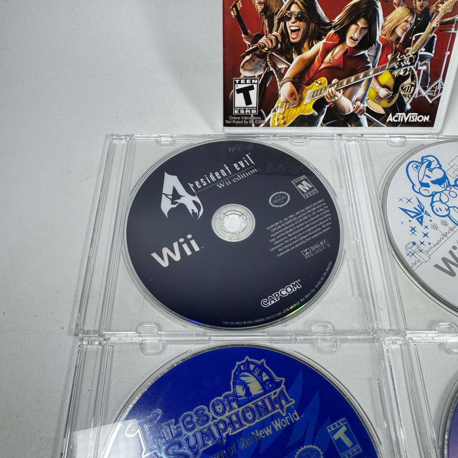 Nintendo Wii Game Assorted Game Bundle Lot of 5 Guitar Hero Super Mario & MORE