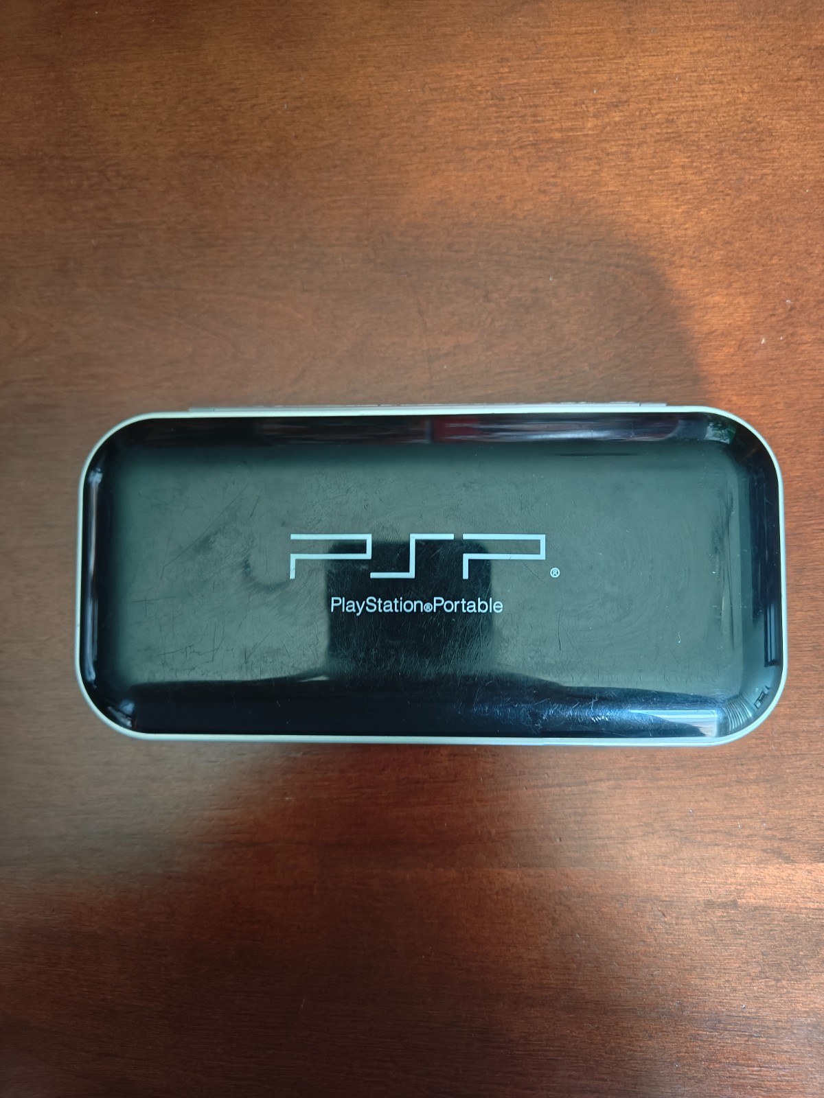 Sony PSP 1000 Silver Handheld System with Charger and Case