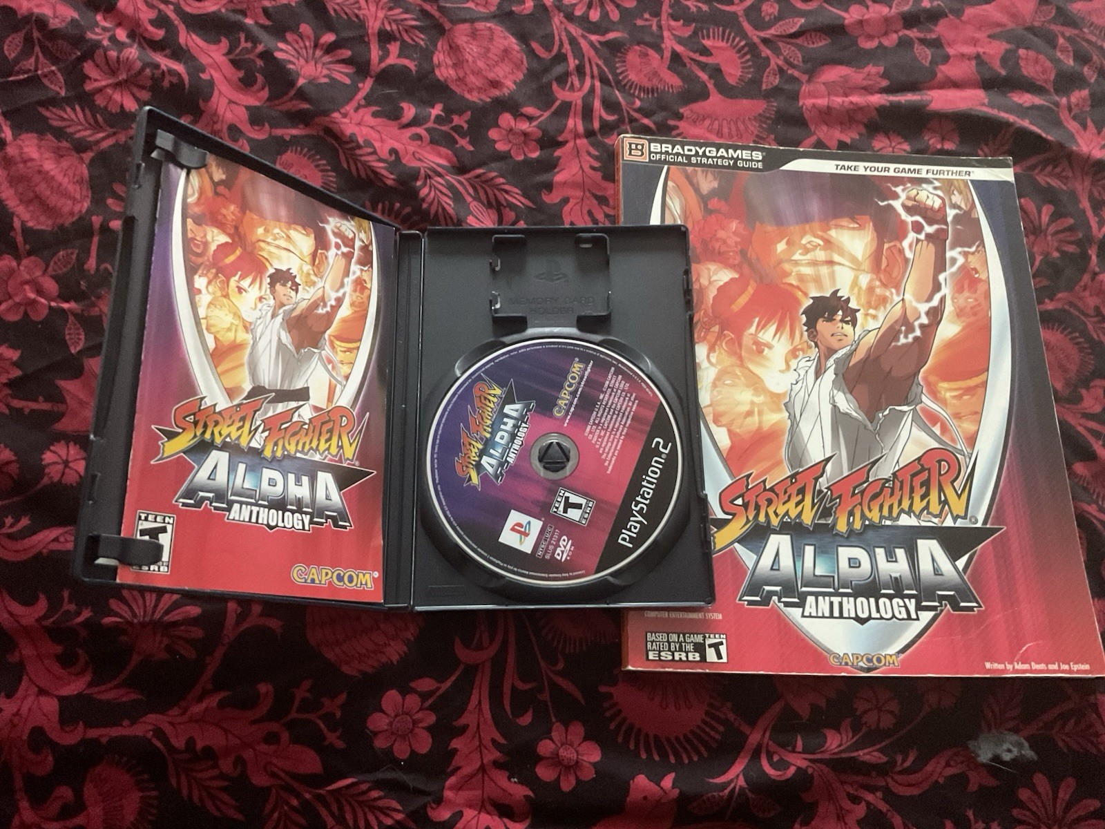 Street Fighter Alpha Anthology for PlayStation 2 with strategy guide.