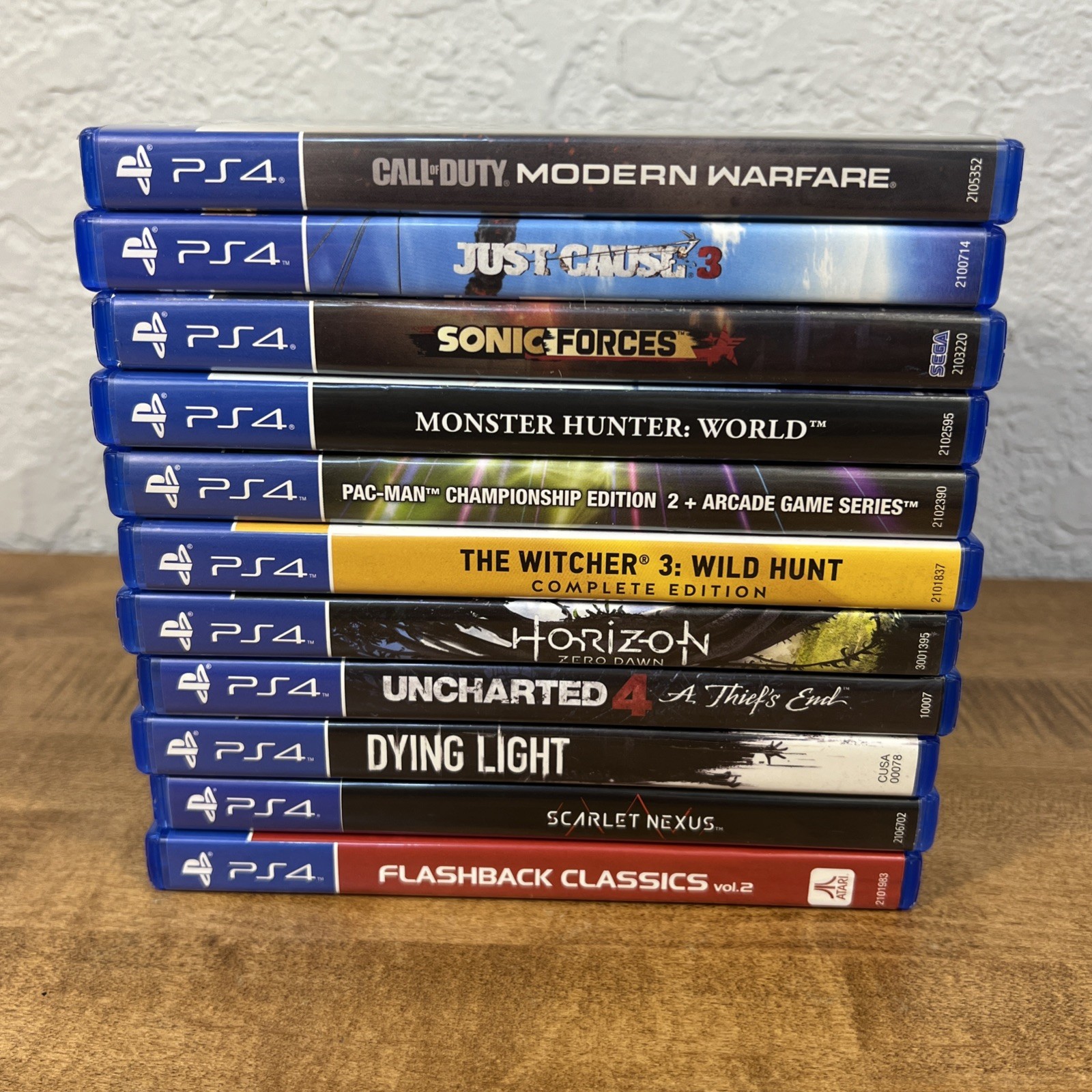 Lot of 11 PS4 Uncharted 4, Dying Light, Horizon, Monster Hunter, Scarlet Nexus..