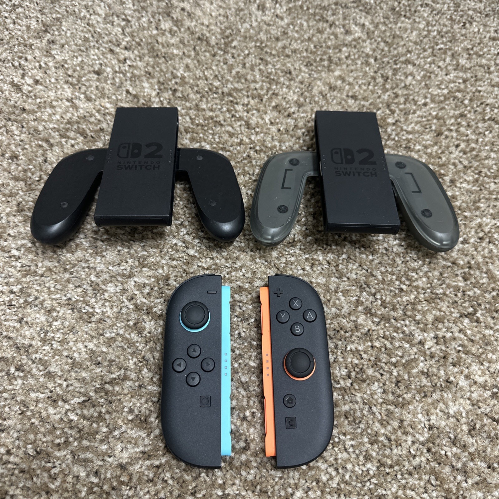 Official Nintendo Switch 2 Joy-Con Blue/Red With 2 Handheld Attachments