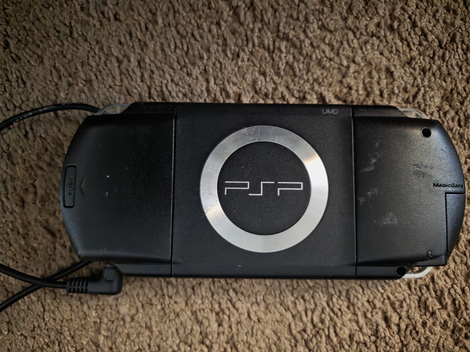 Sony Psp 1001 Handheld Console, With Charger And Dozens Of Games Built In!