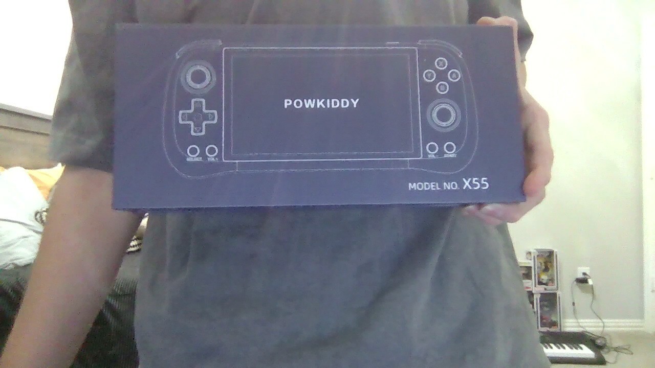 Powkiddy x55 5.5 inch 144 gb card included with charger and in good condition