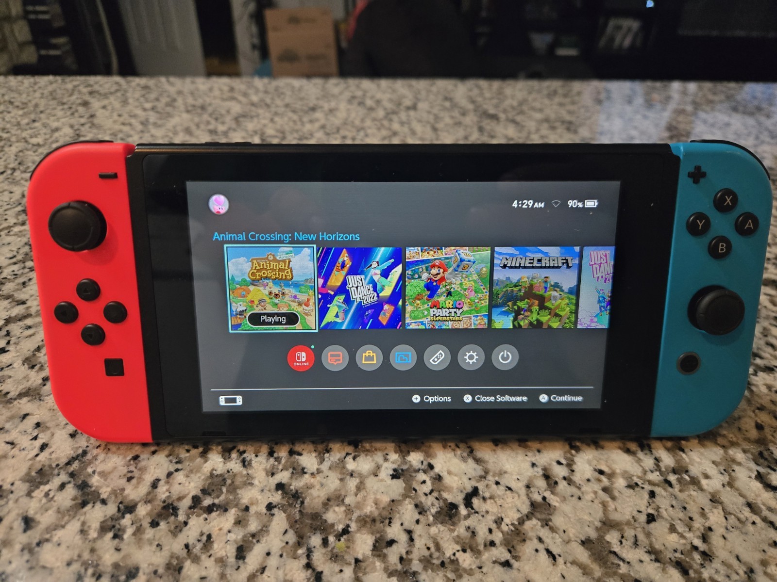 Nintendo Switch Console Handheld System w/ Neon Red & Blue Joy-Con, CLEAN