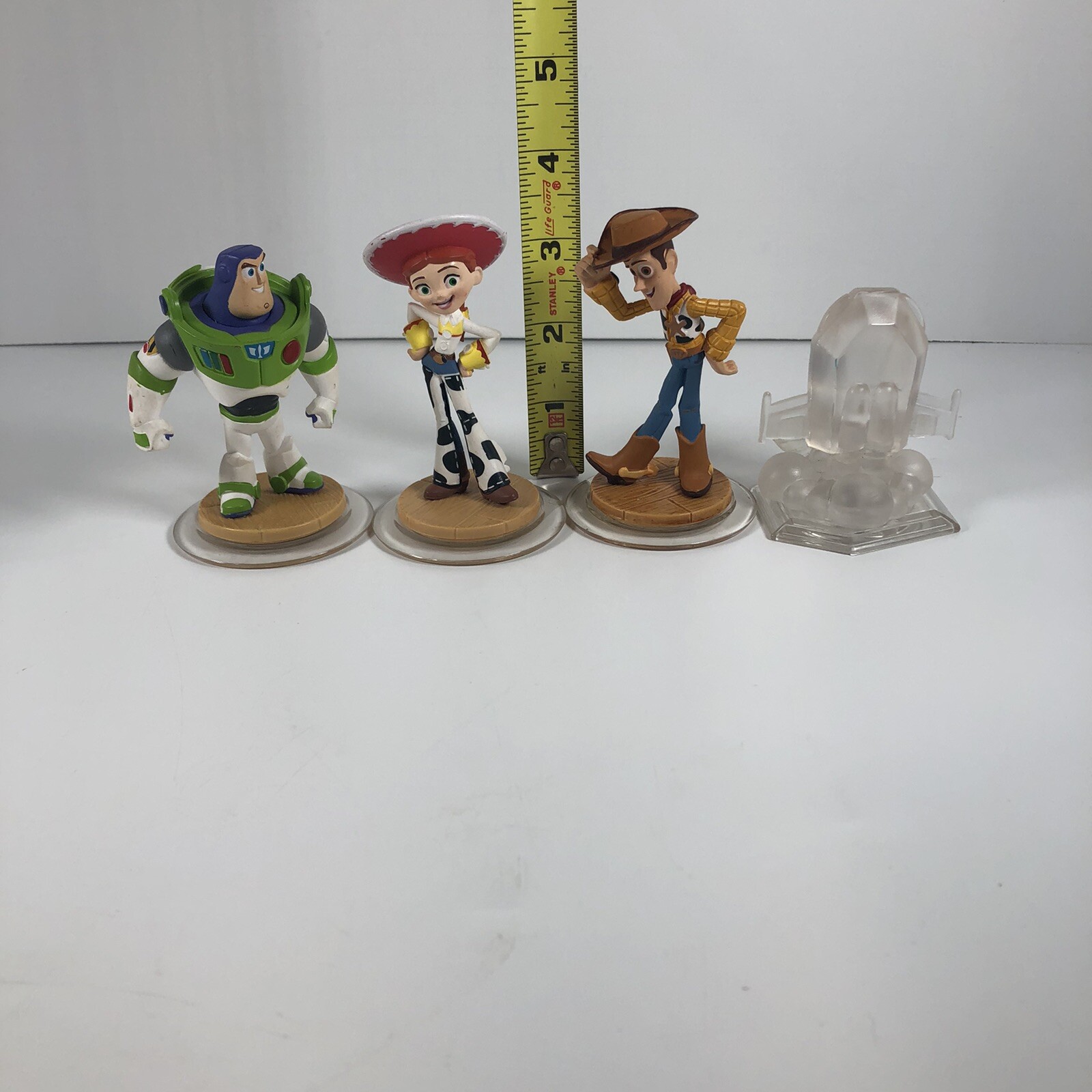 Lot Of 4 Disney Infinity Toy Story Woody Jessie Buzz Lightyear & Crystal Figure