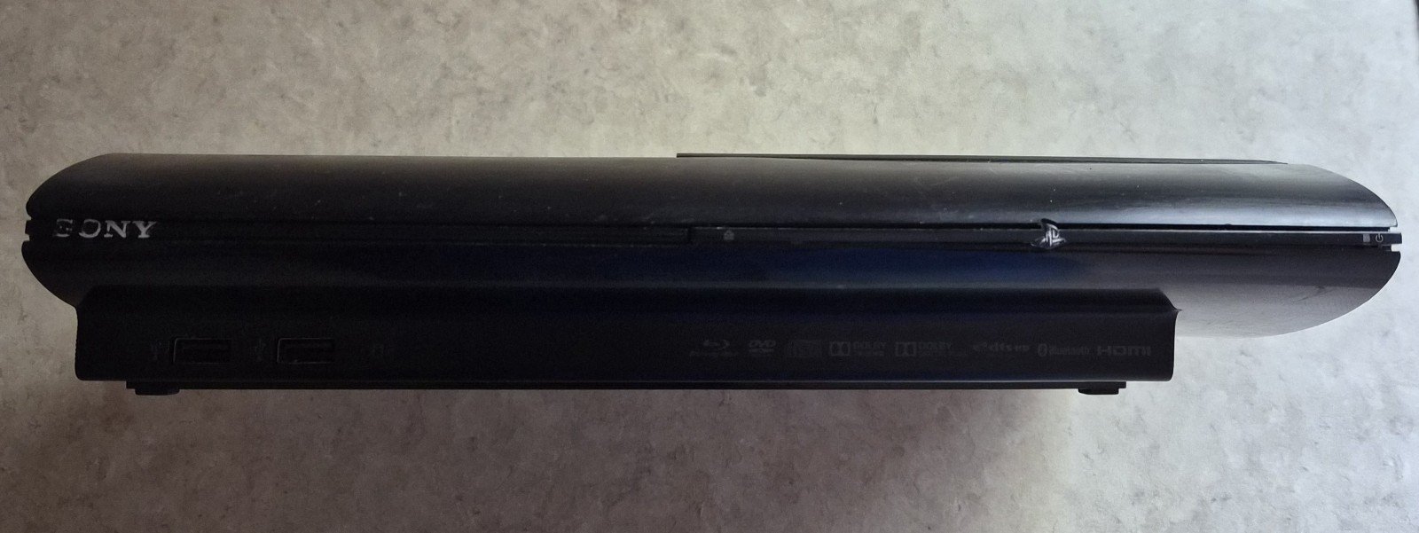 Sony PS3 Super Slim Console Bundle with 4 Titles