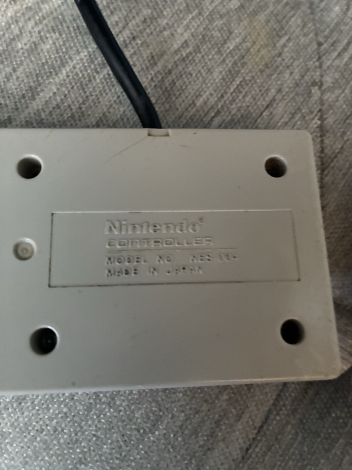 2 Vintage Nintendo NES OEM Controllers, RF Adapter, And Manual.