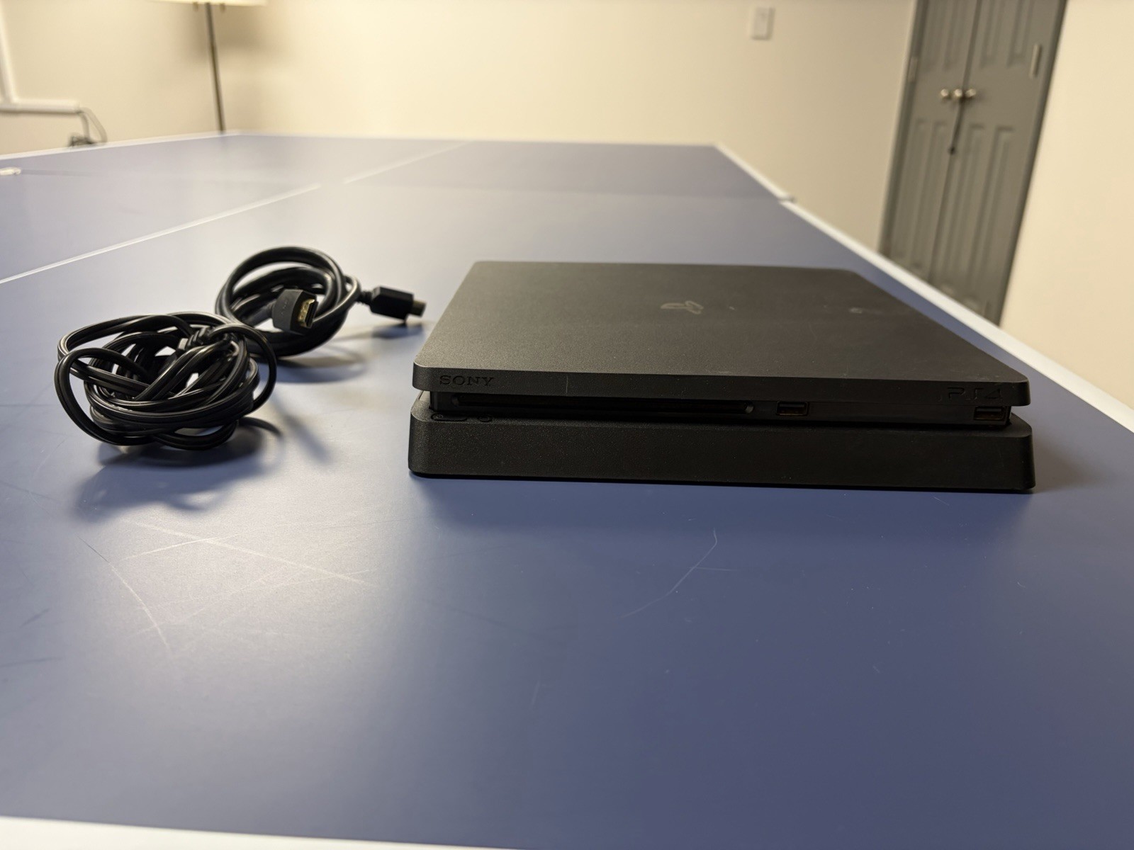 Lightly used Black Ps4 slim console with power and HDMI cord, 500gb of storage