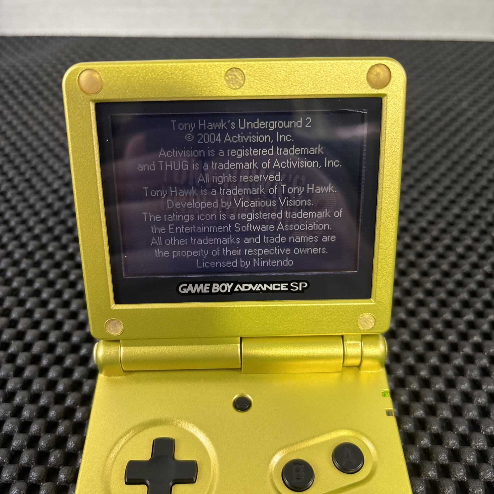 Nintendo Game Boy Advance SP Gold w/Tony Hawk’s Underground 2 OEM Charger