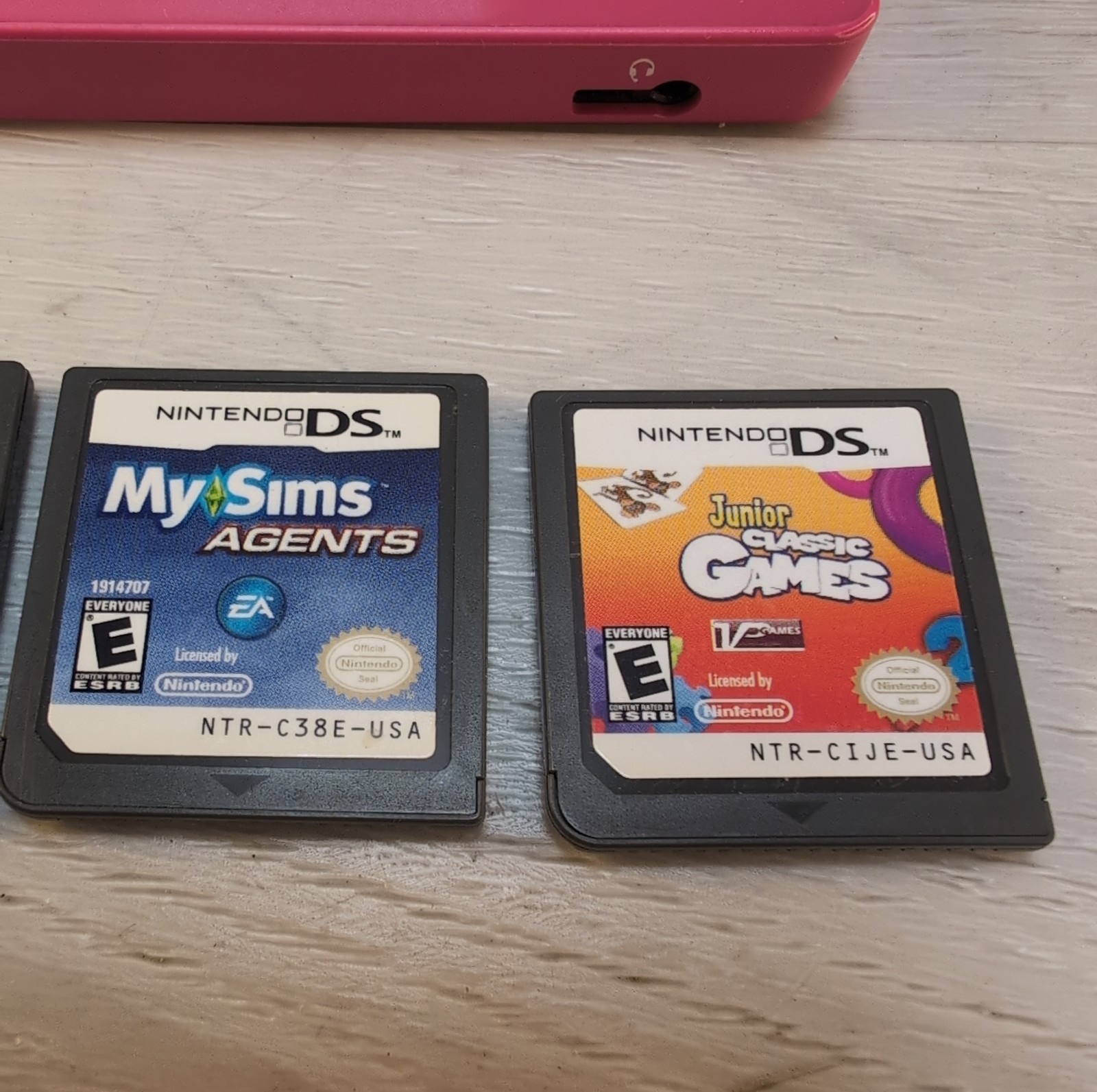 Nintendo DSi Pink Handheld Console Wi-Fi Nintendo DS TWL-001 & (4) Games Sims