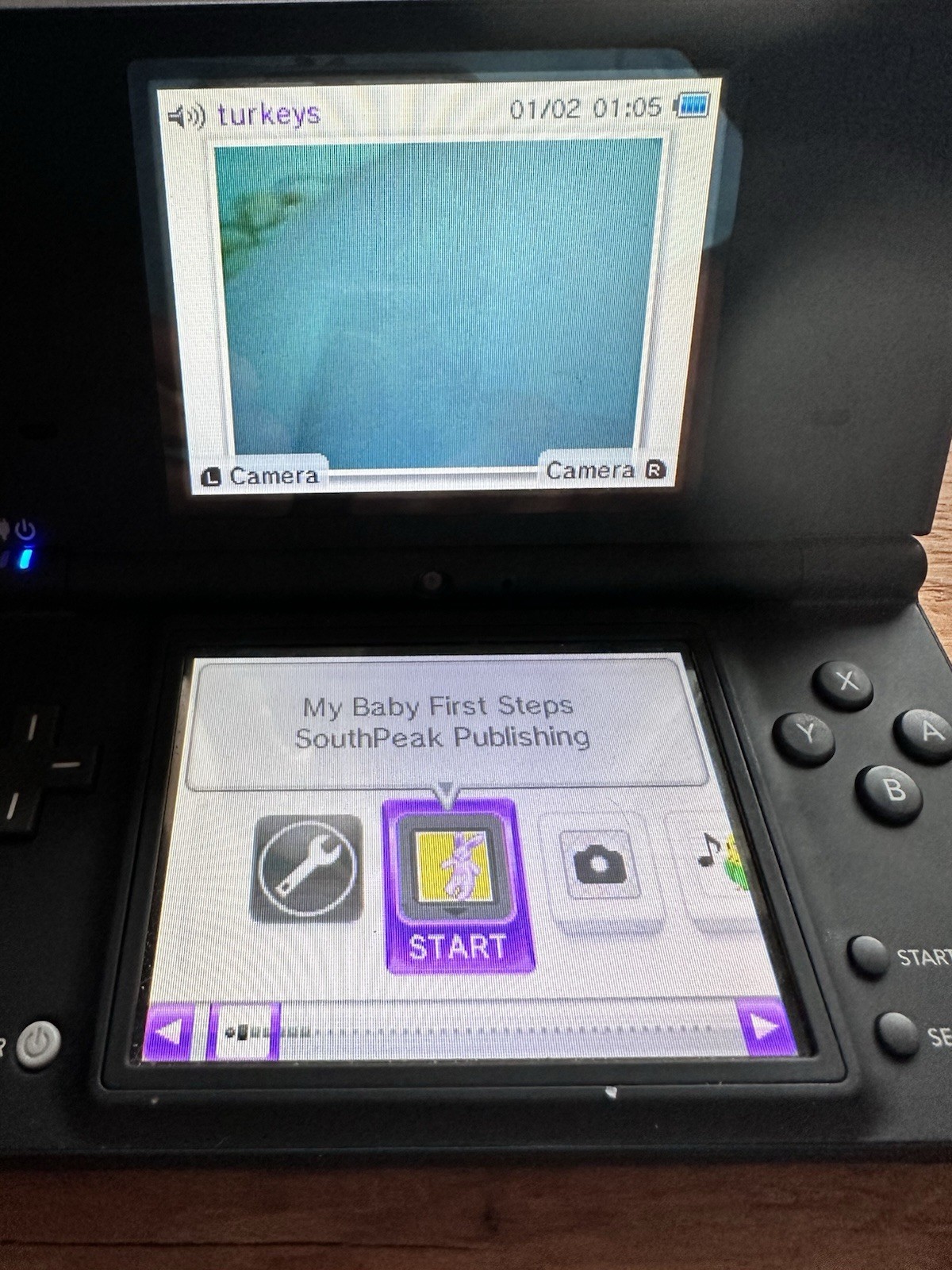 Nintendo DSi Black Bundle TWL-001 – 4 Games, Charger, 1GB SD Card – Tested