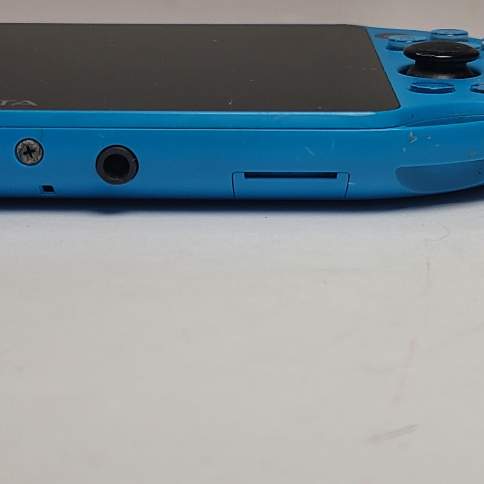 Sony PS Vita PCH 2000 ZA23 Aqua Blue Slim Console W/ LEGO Jurassic World Game