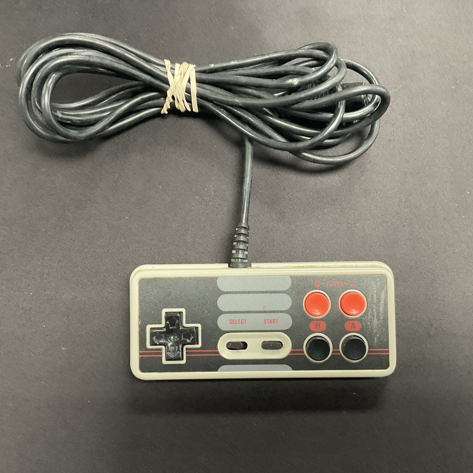 Nintendo NES 4-Button Turbo Gamepad Controller by Tengen