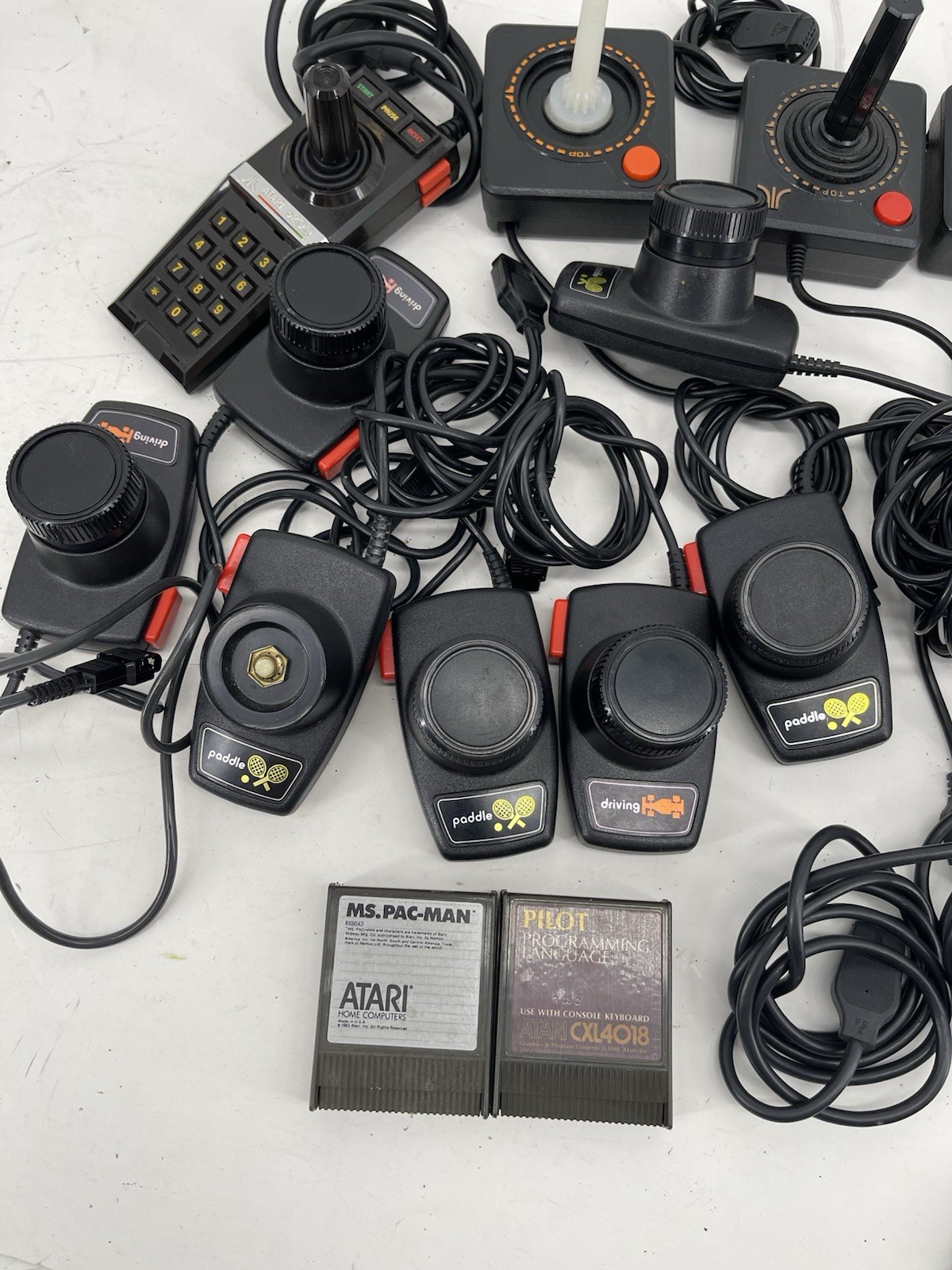 Huge Bulk Lot 15 Atari 2600 Controllers Joysticks Paddles, Adapter & Games