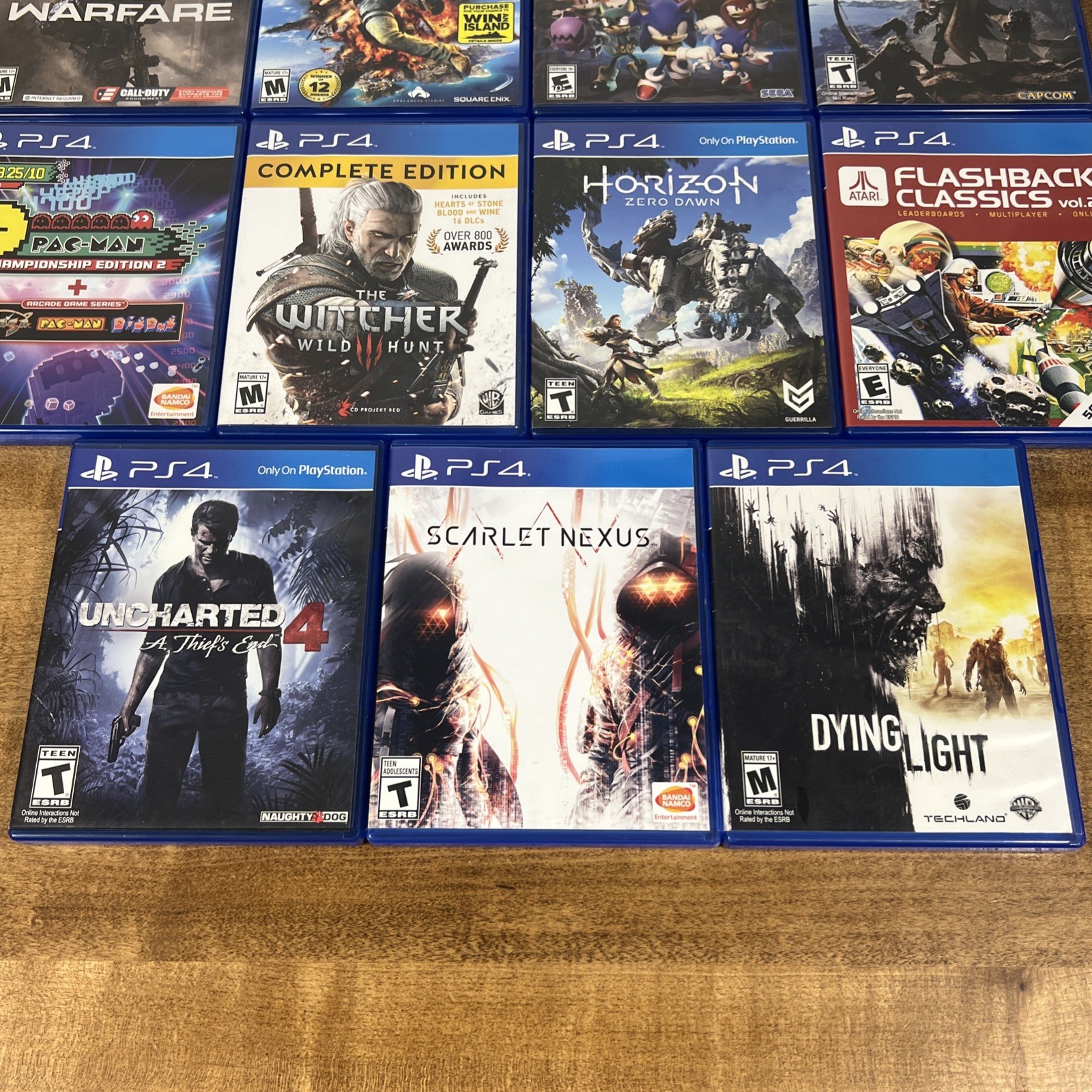 Lot of 11 PS4 Uncharted 4, Dying Light, Horizon, Monster Hunter, Scarlet Nexus..