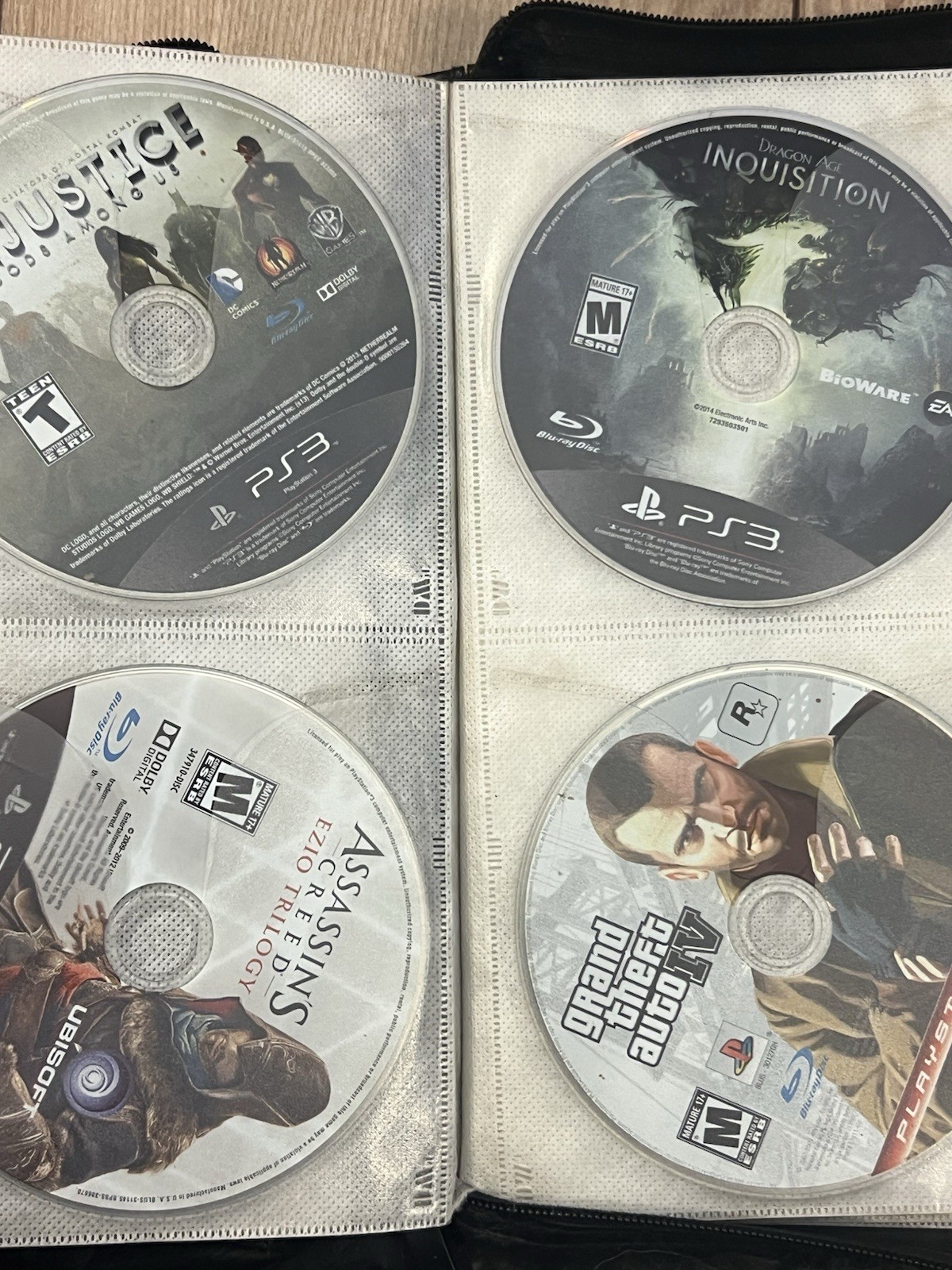 Lot Of 64 Sony Playstation 3 PS3 Disc Only Games Binder Untested Mixed Games