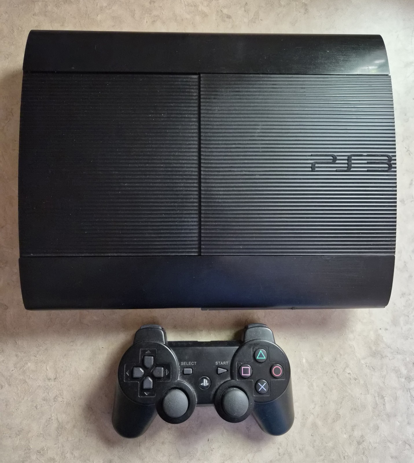 Sony PS3 Super Slim Console Bundle with 4 Titles