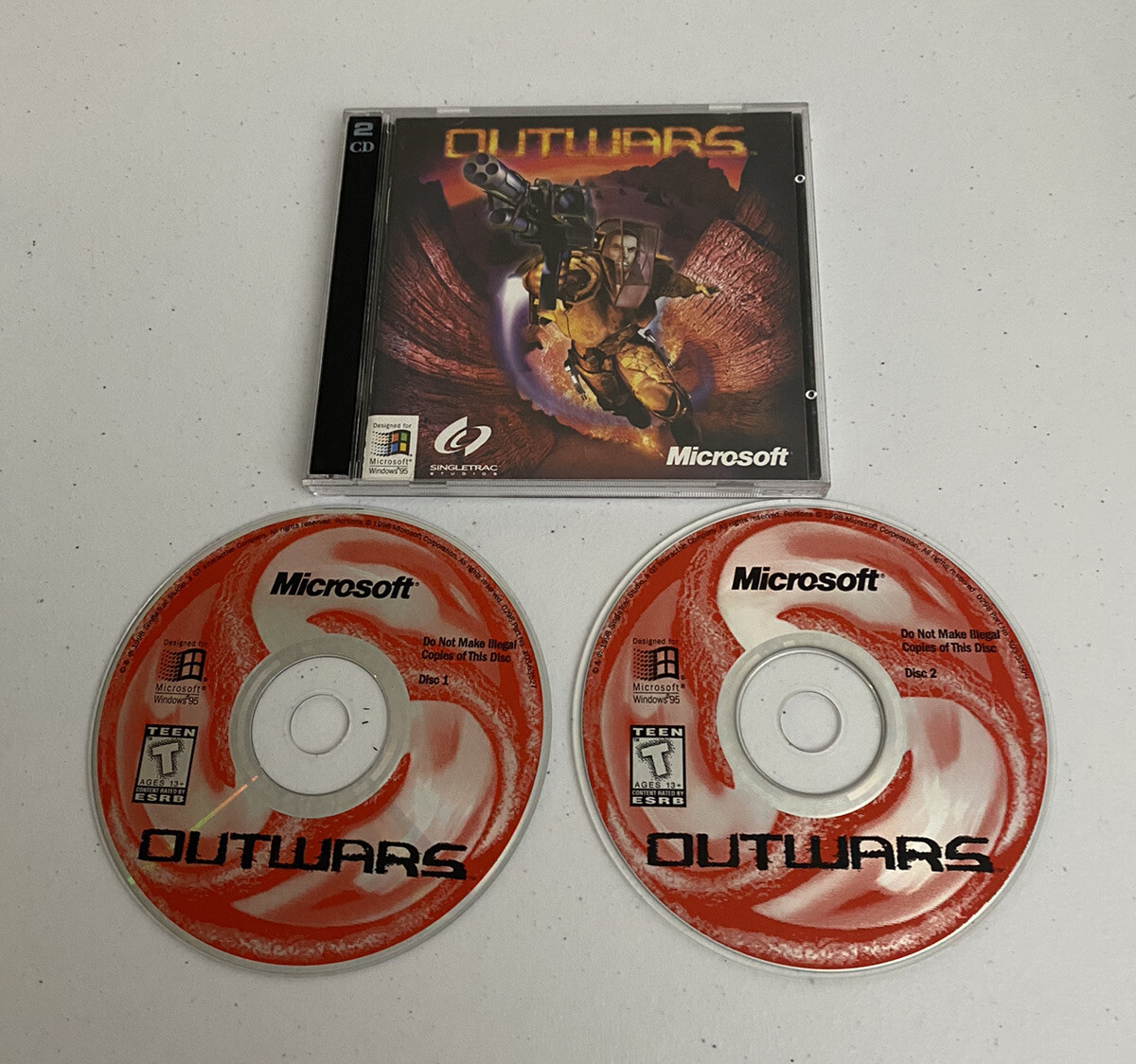 Outwars – 1998 Microsoft Windows 95 – 2 CDs – Jewel Case – Manual