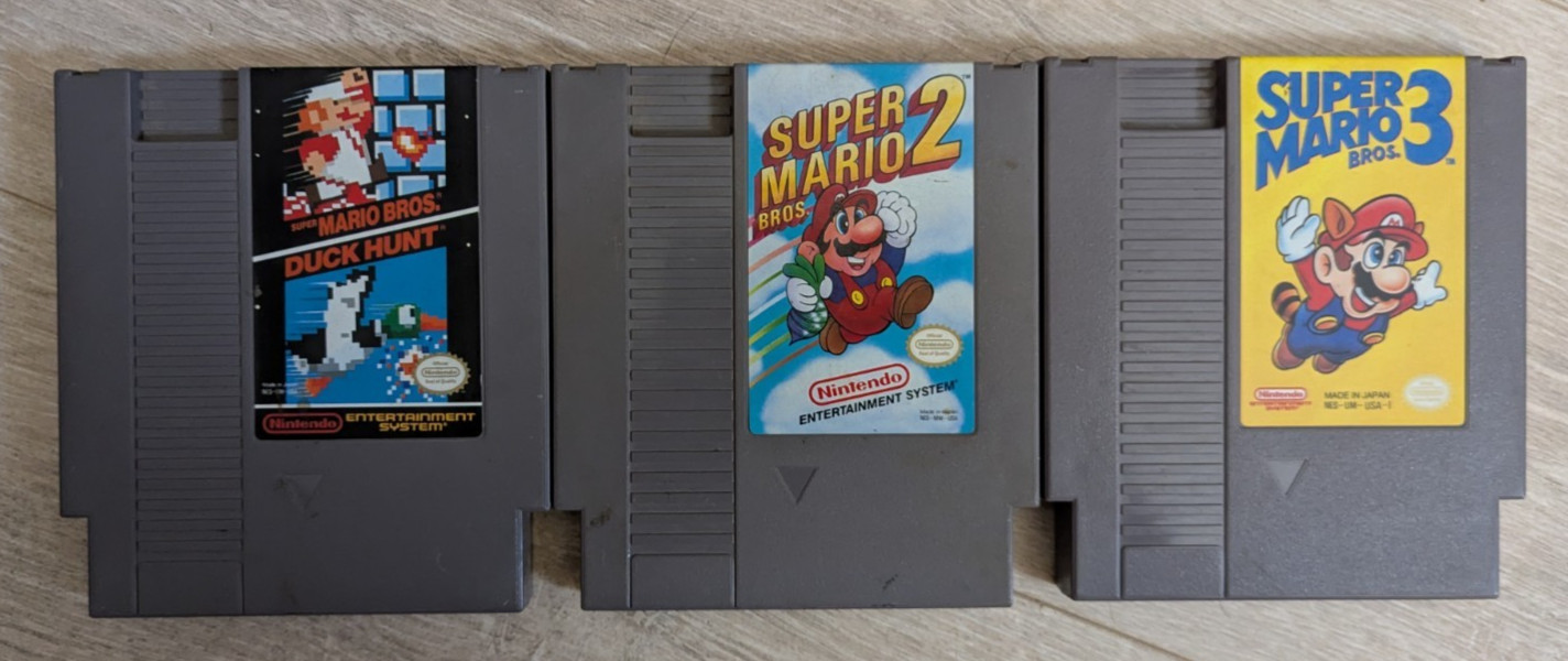 Original Nintendo NES Entertainment System w/ Super Mario Bros 1-3 & Game Genie
