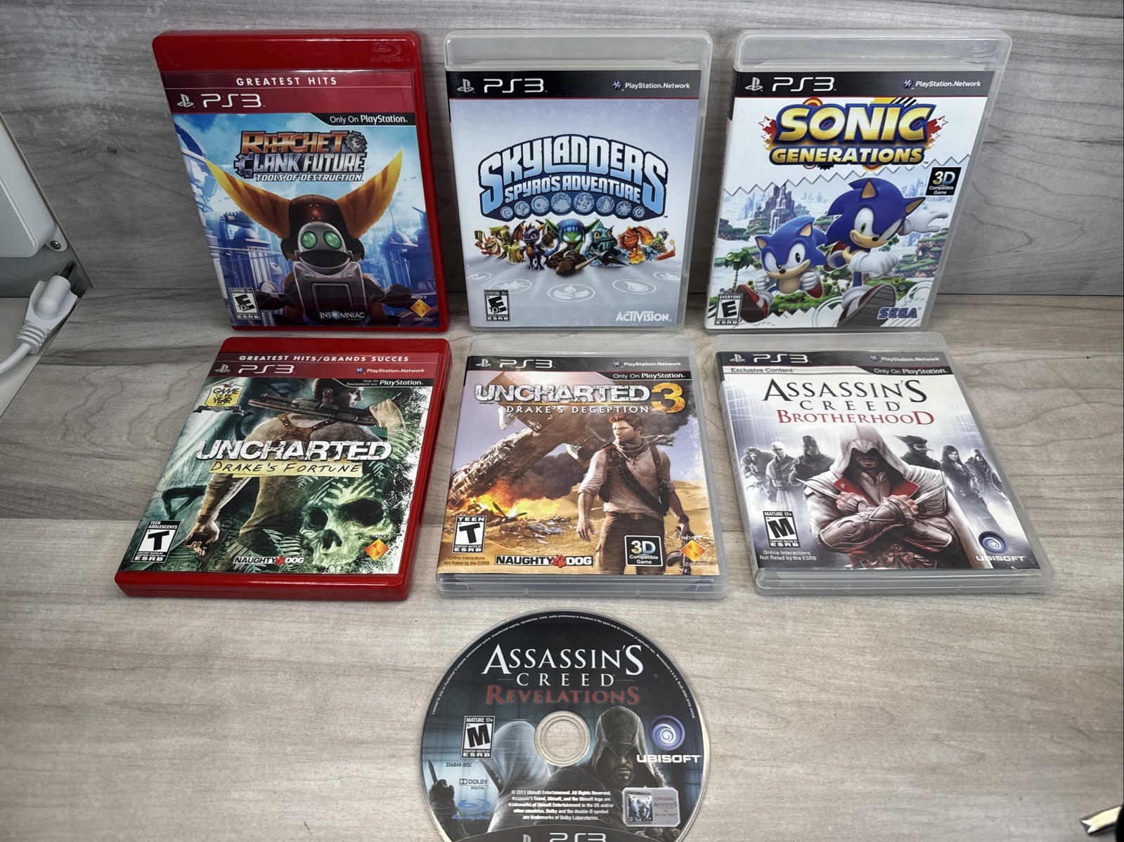 PS3 7 Game Bundle Ratchet Clank Future Skylanders Uncharted Drake’s Sonic Creed