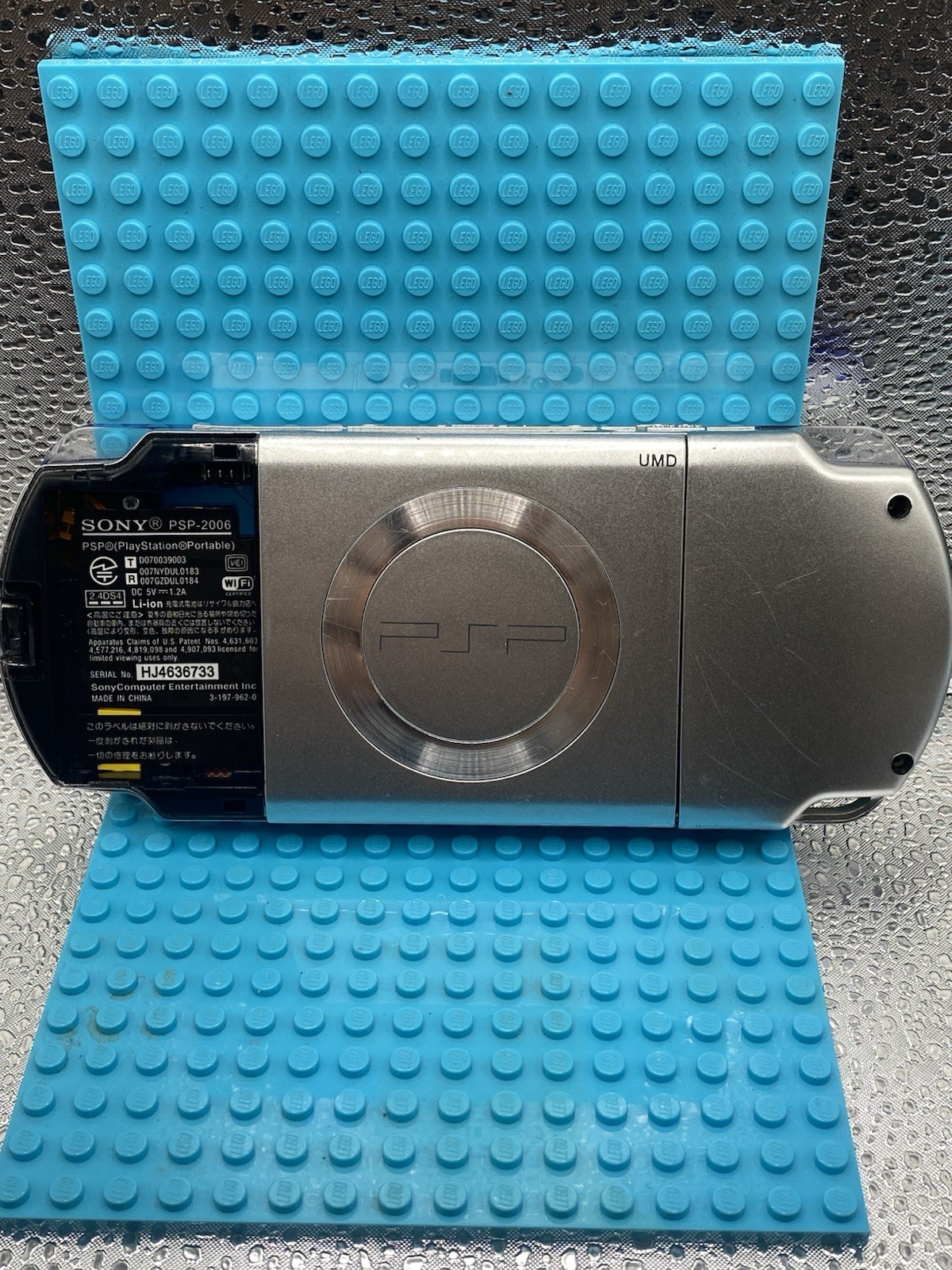 PlayStation PSP-2006 Silver No Battery Turns On Does Not Read Disk For Parts