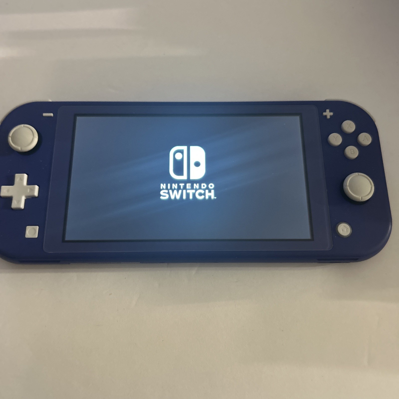 Nintendo Switch Lite – Blue – Box/ Charger/ Case!!- Tested!