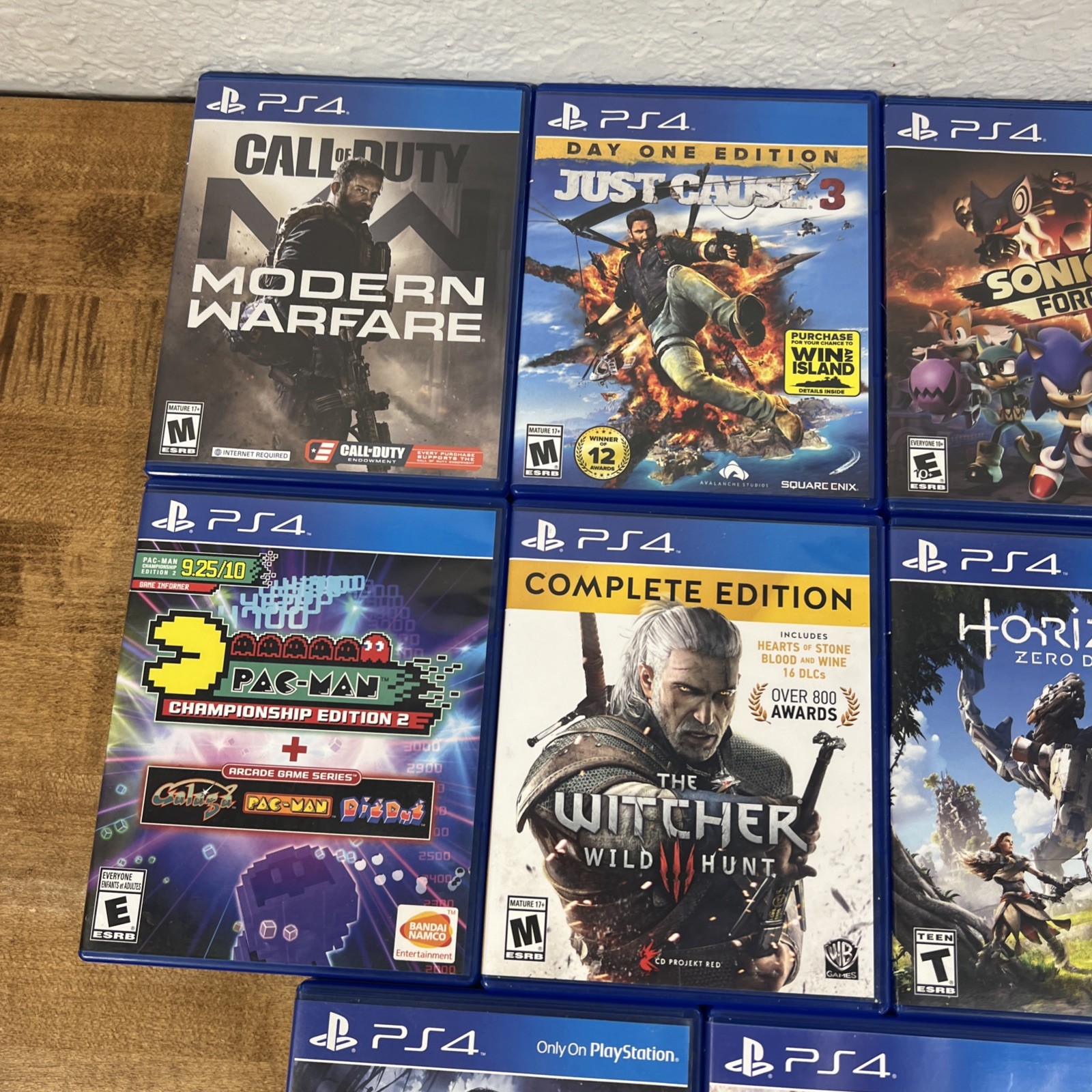 Lot of 11 PS4 Uncharted 4, Dying Light, Horizon, Monster Hunter, Scarlet Nexus..