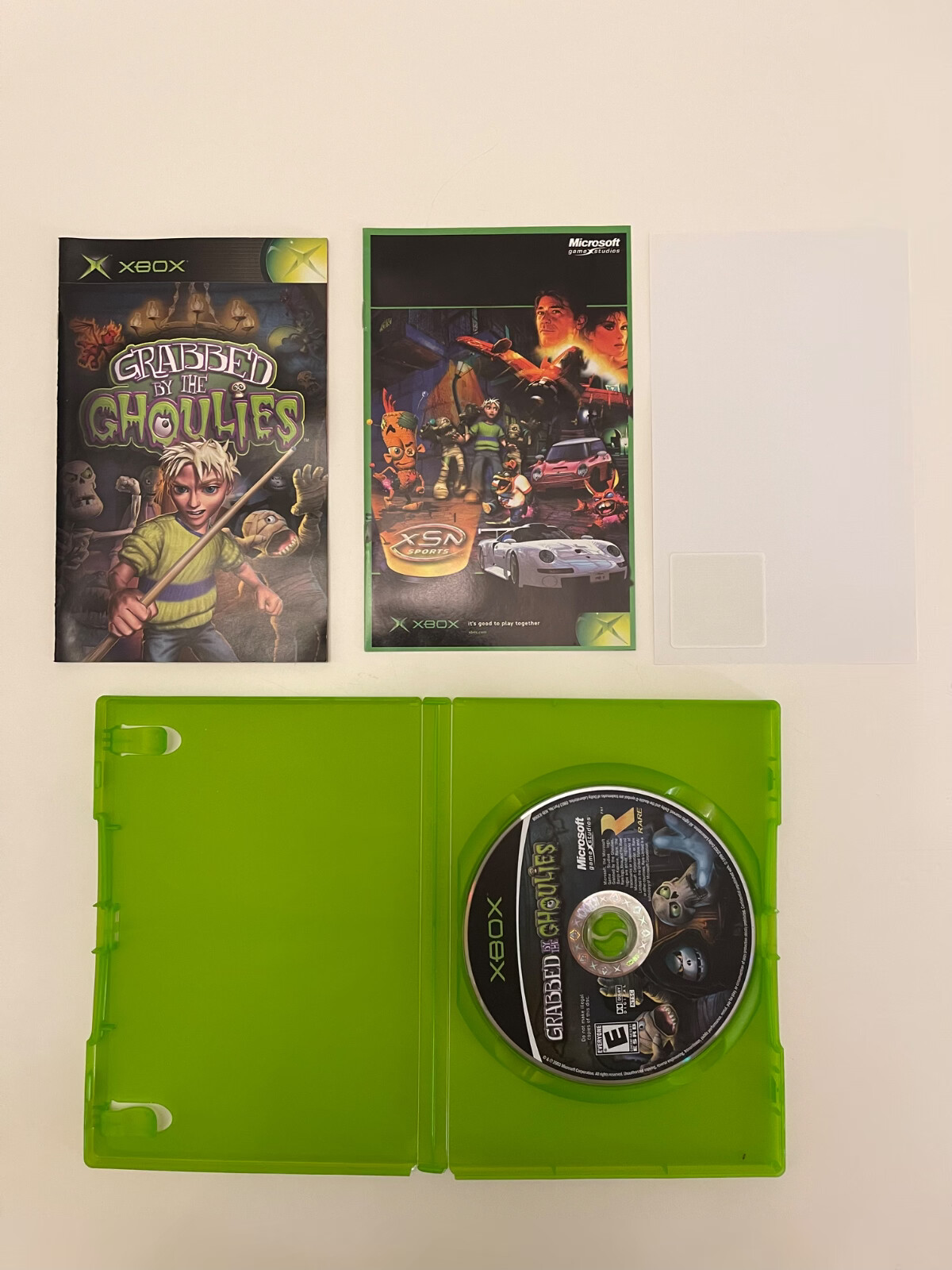 Grabbed by the Ghoulies (Microsoft Xbox, 2003) CIB COMPLETE. Tested & Working!