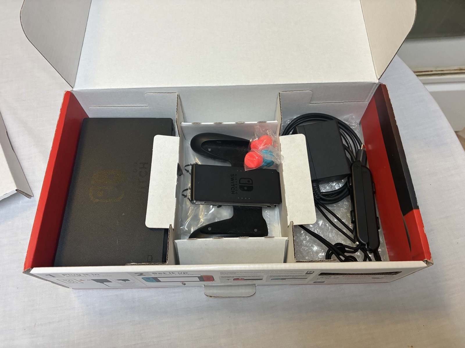 Nintendo Switch Bundle Includes Case, Joycon Controller Holders & Box