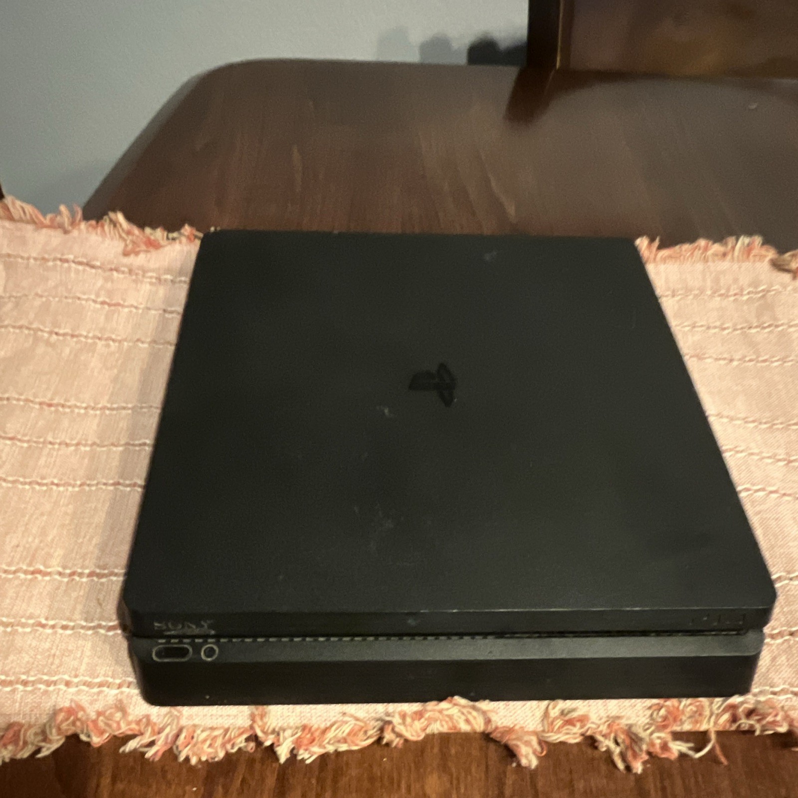 Sony PlayStation 4 Slim Console + DualShock 4 Controller, 4 Games and cables