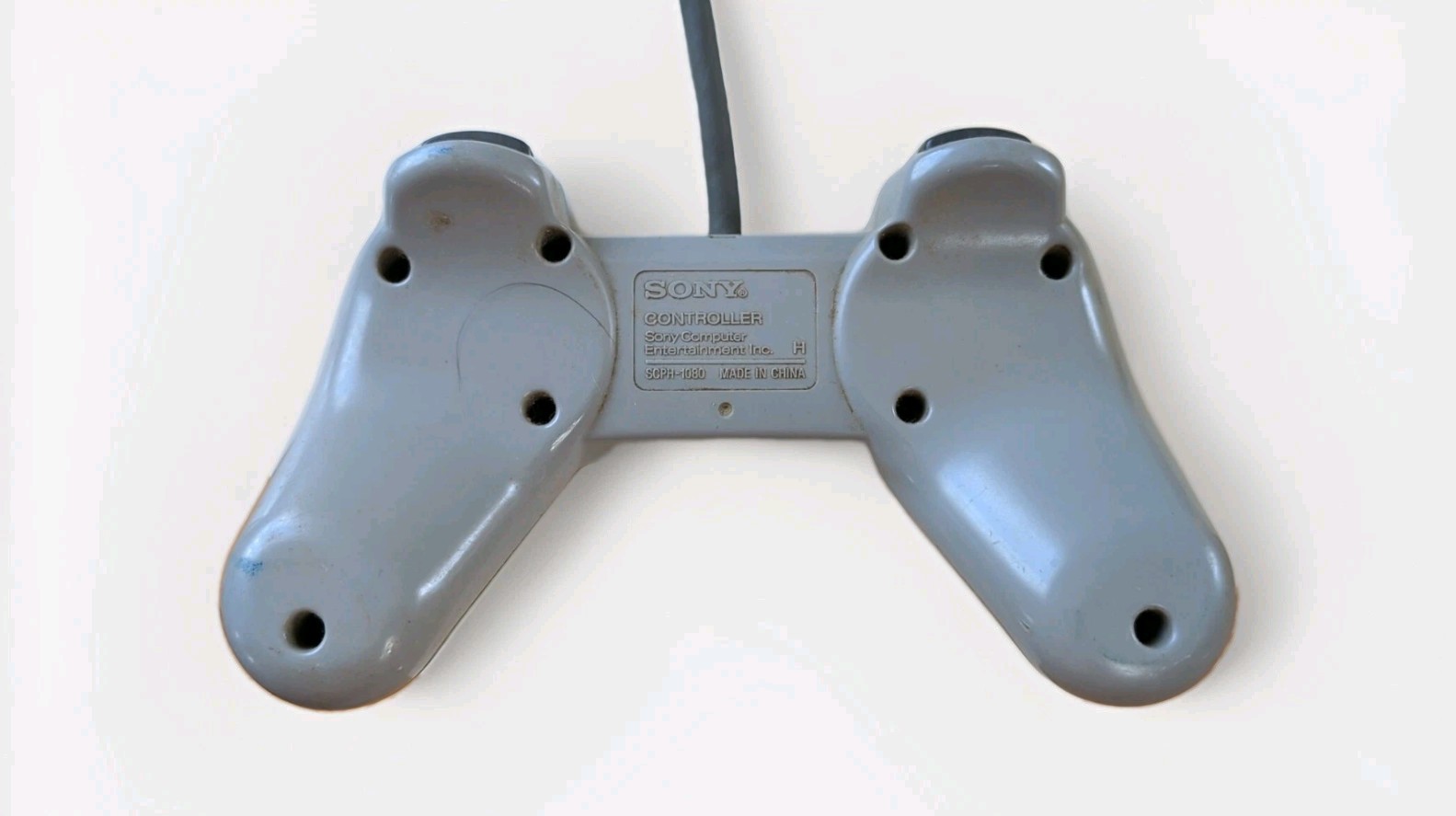 Sony PlayStation 1 Light Gray Controllers (x2) – Untested