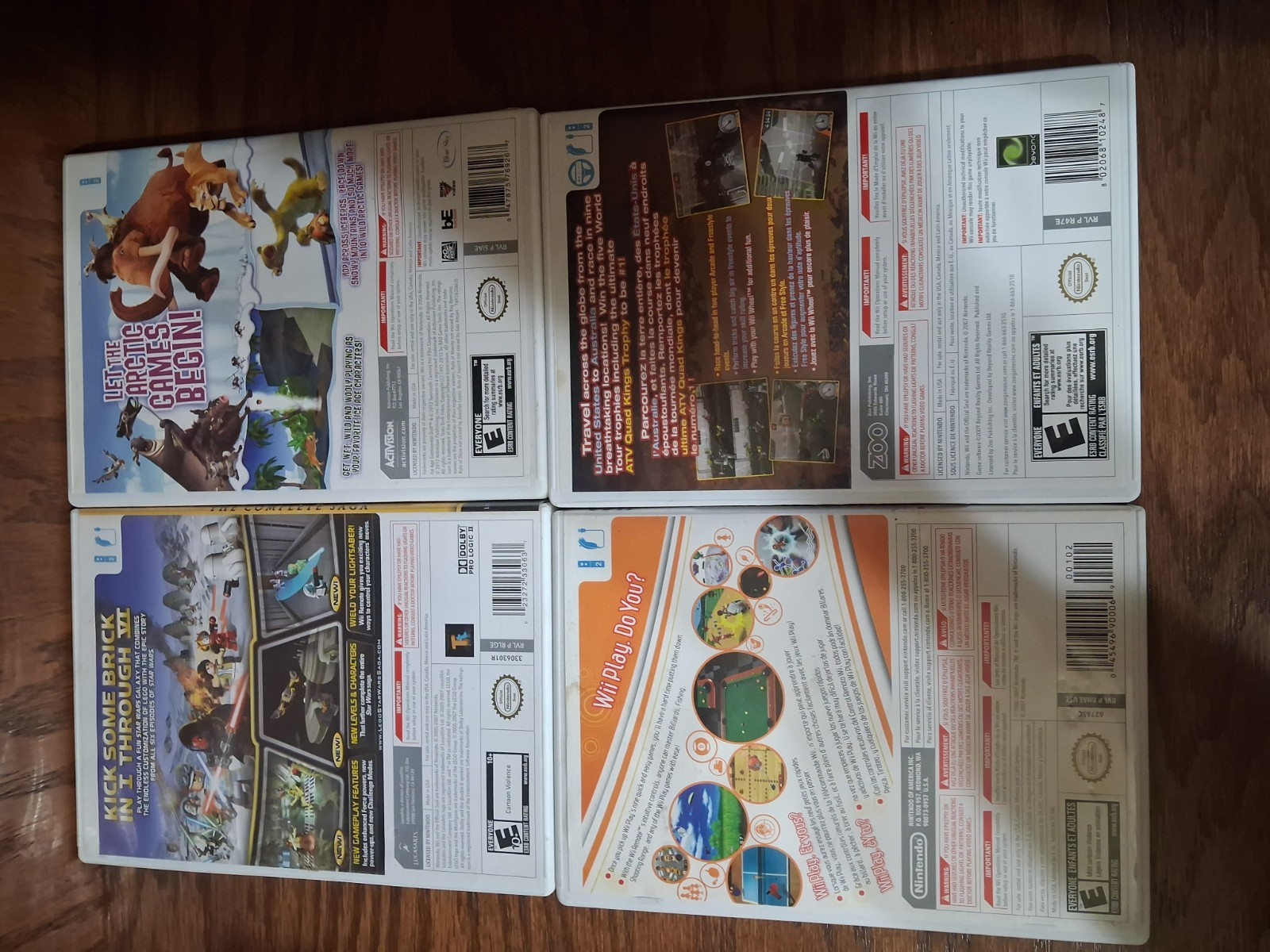 Nintendo Wii Game Lot: Ice Age, Wii Play, LEGO Star Wars, ATV Quad Kings & more.