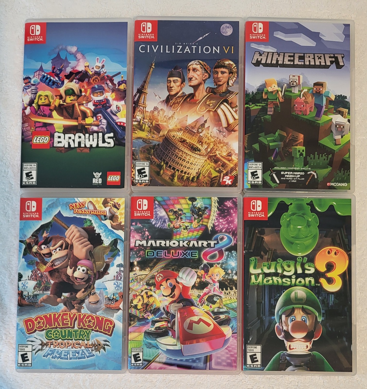 Nintendo Switch Game Lot Mario Kart 8, Donkey Kong, Luigi’s Mansion, Minecraft
