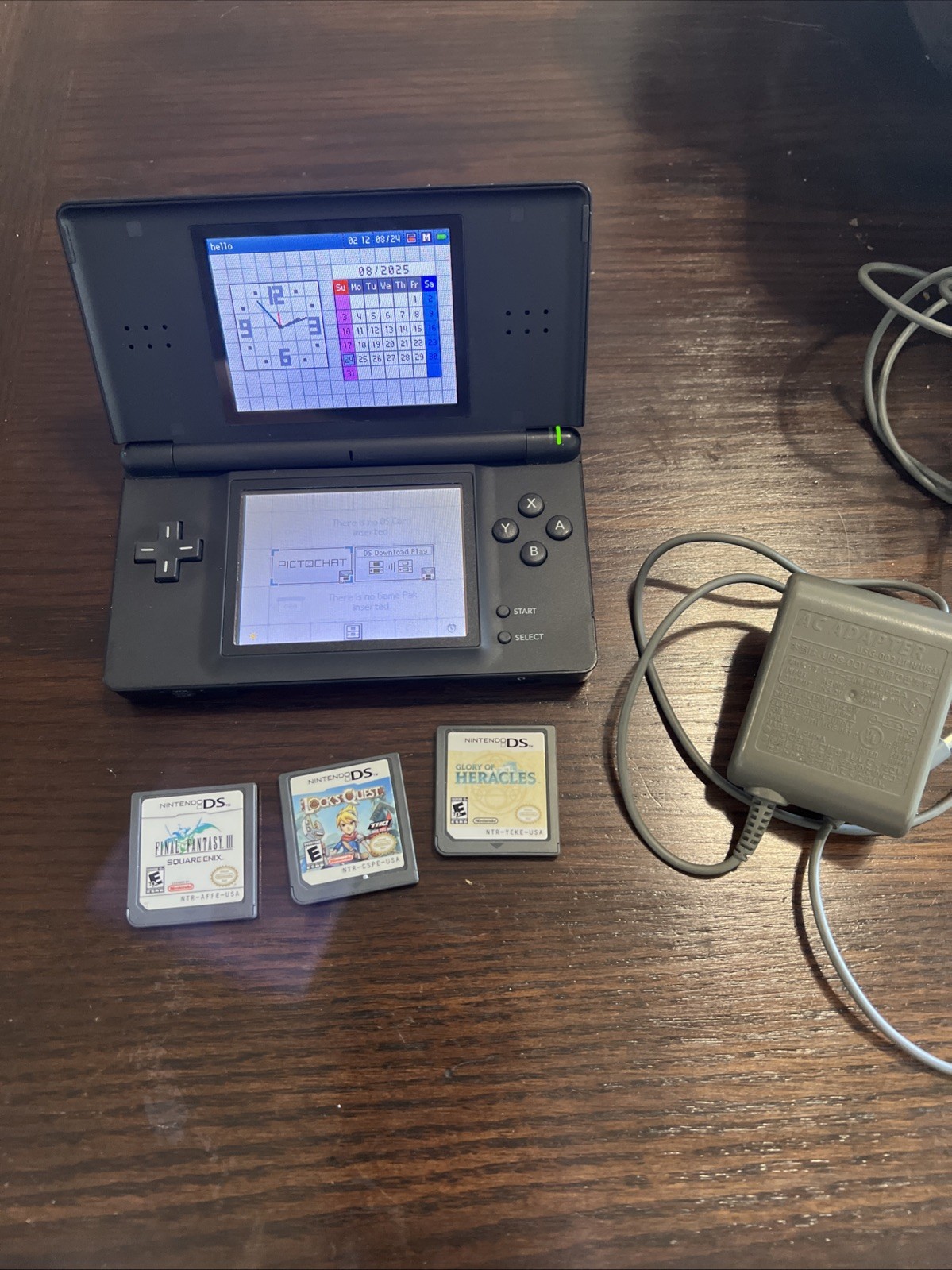 Nintendo DS Lite Onyx Black Console w/ Stylus, 3 Games And Charger. Tested