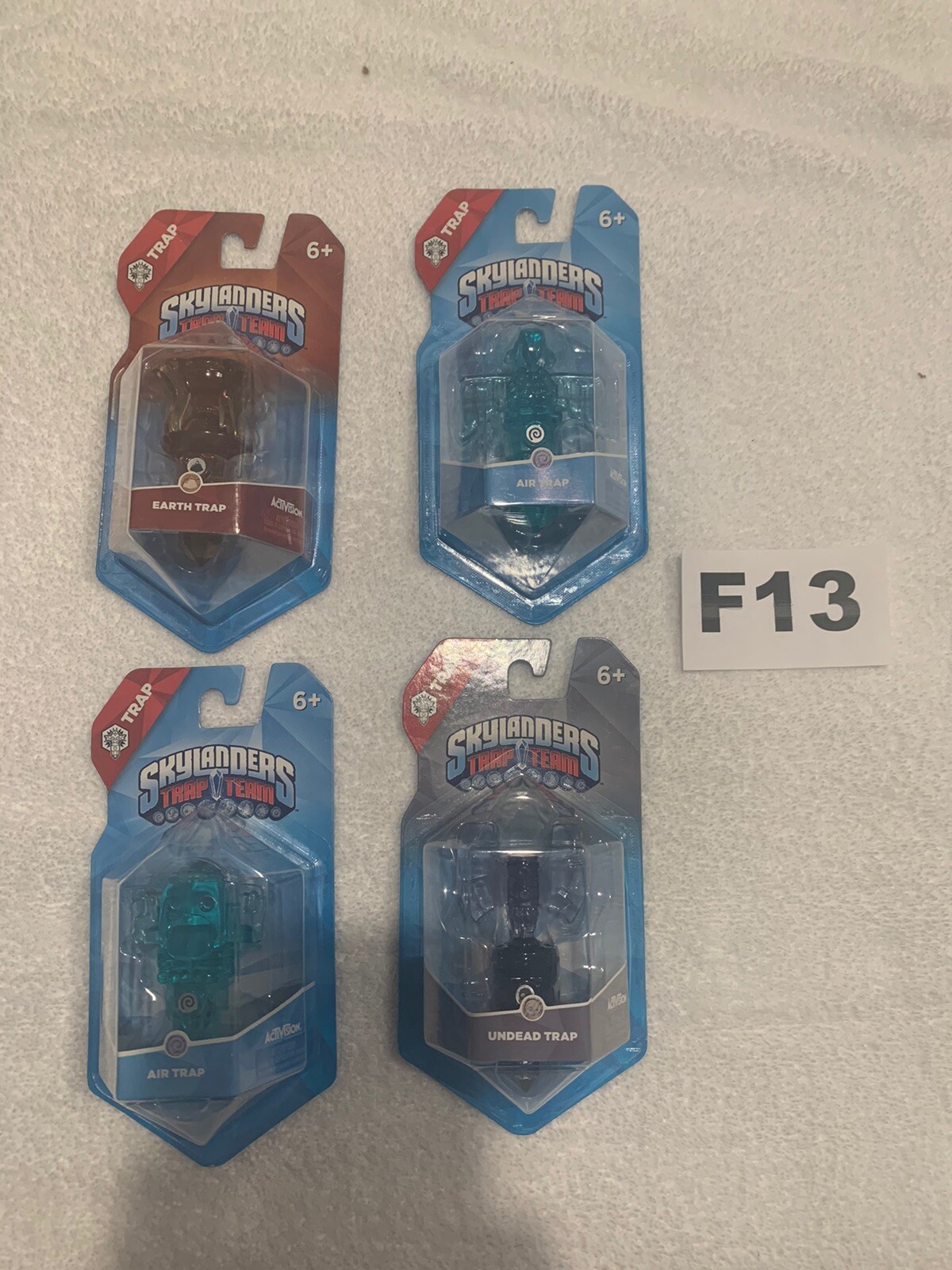 Skylanders Trap Team 4-pack Air Screamer Air Toucan Earth Hourglass Undead Axe