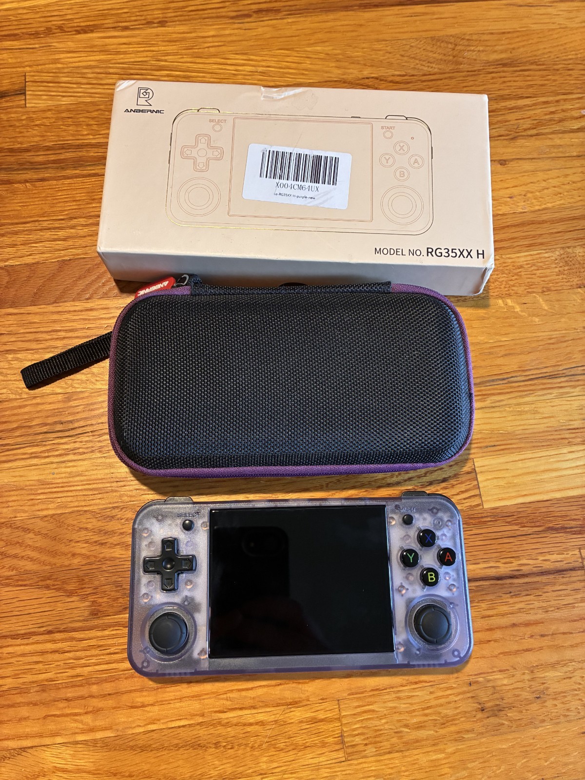 Anbernic RG35XX 64GB Handheld Console – Purple Transparent with case, charger